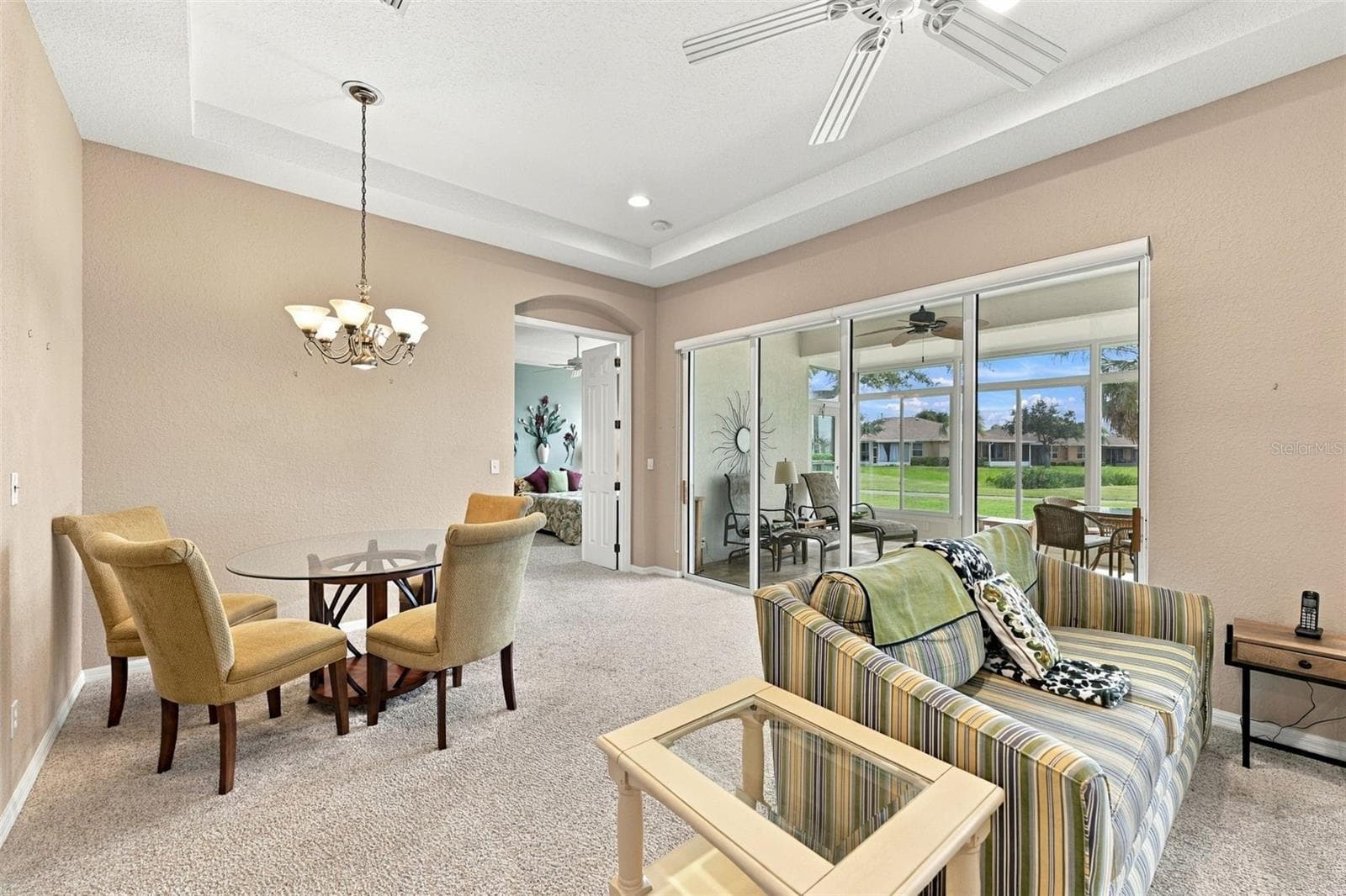 Family Room Looking into the  Dining Area - 2418 KENSINGTON GREENS DR #9, SUN CITY CENTER