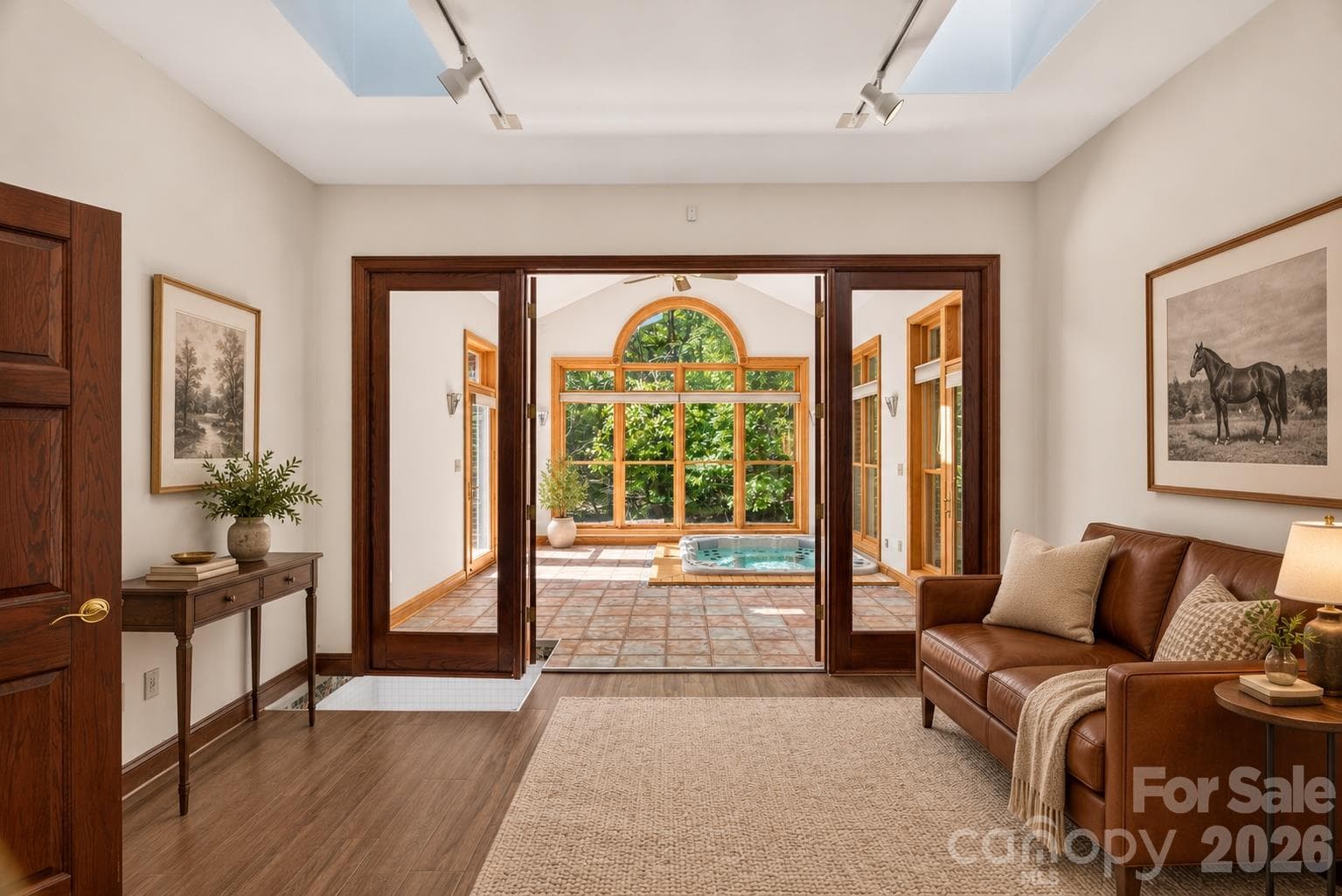 Primary suite reading/sitting area flows from bedroom to sitting to spa area - 253 Highway 161 South, Clover