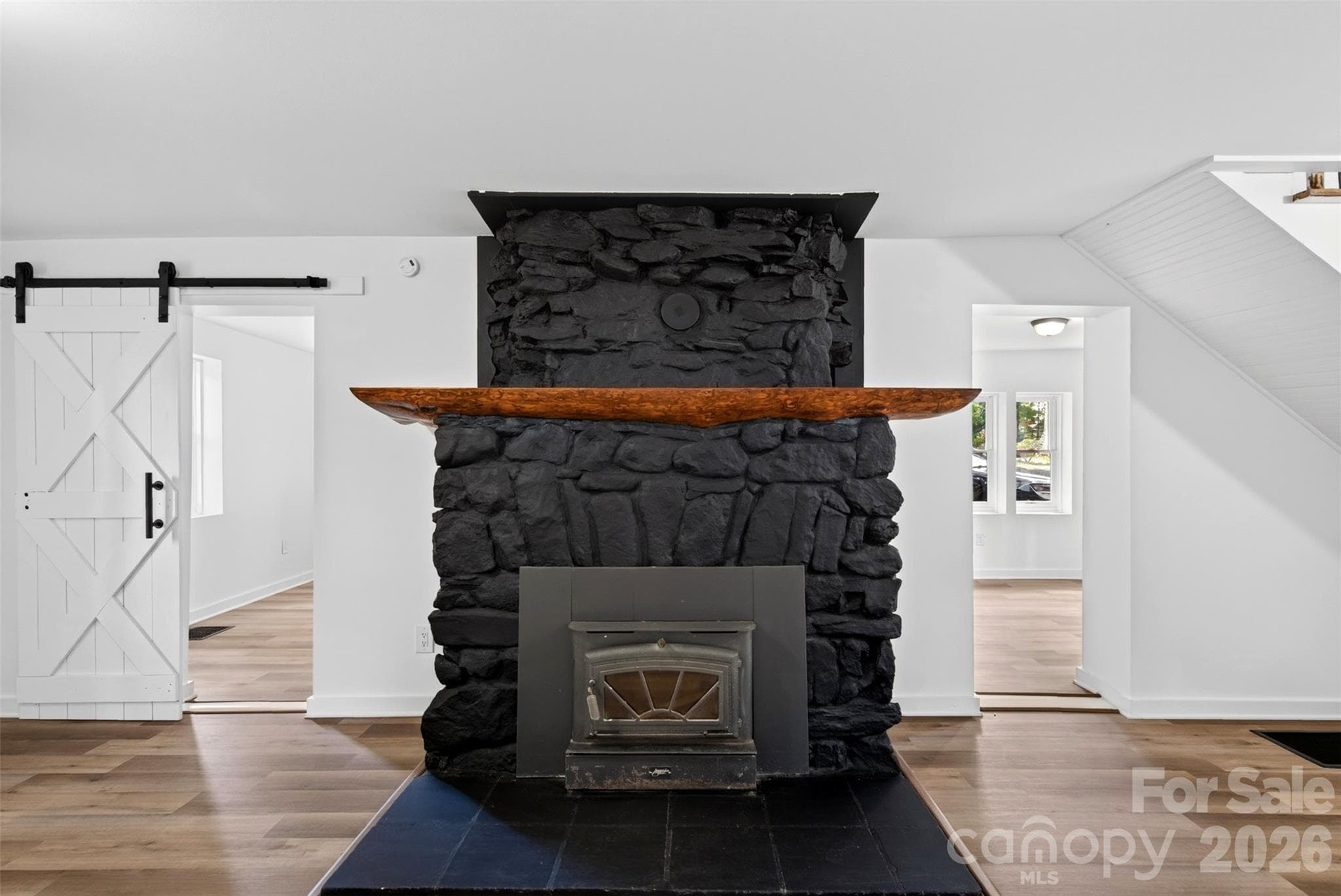 Wood-burning stove with original mantel. - 64 Pine Cone Drive, Asheville