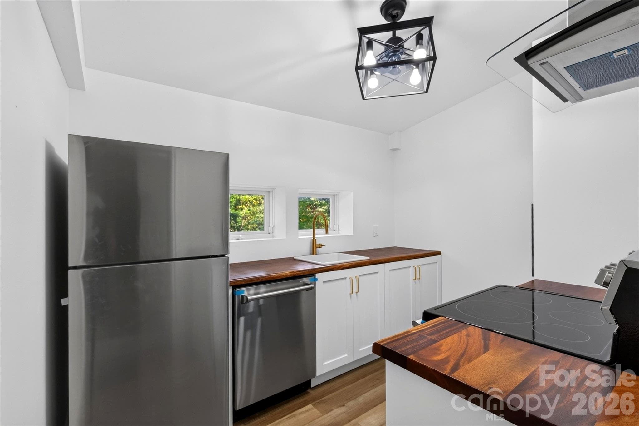 Updated kitchen with new appliances - 64 Pine Cone Drive, Asheville