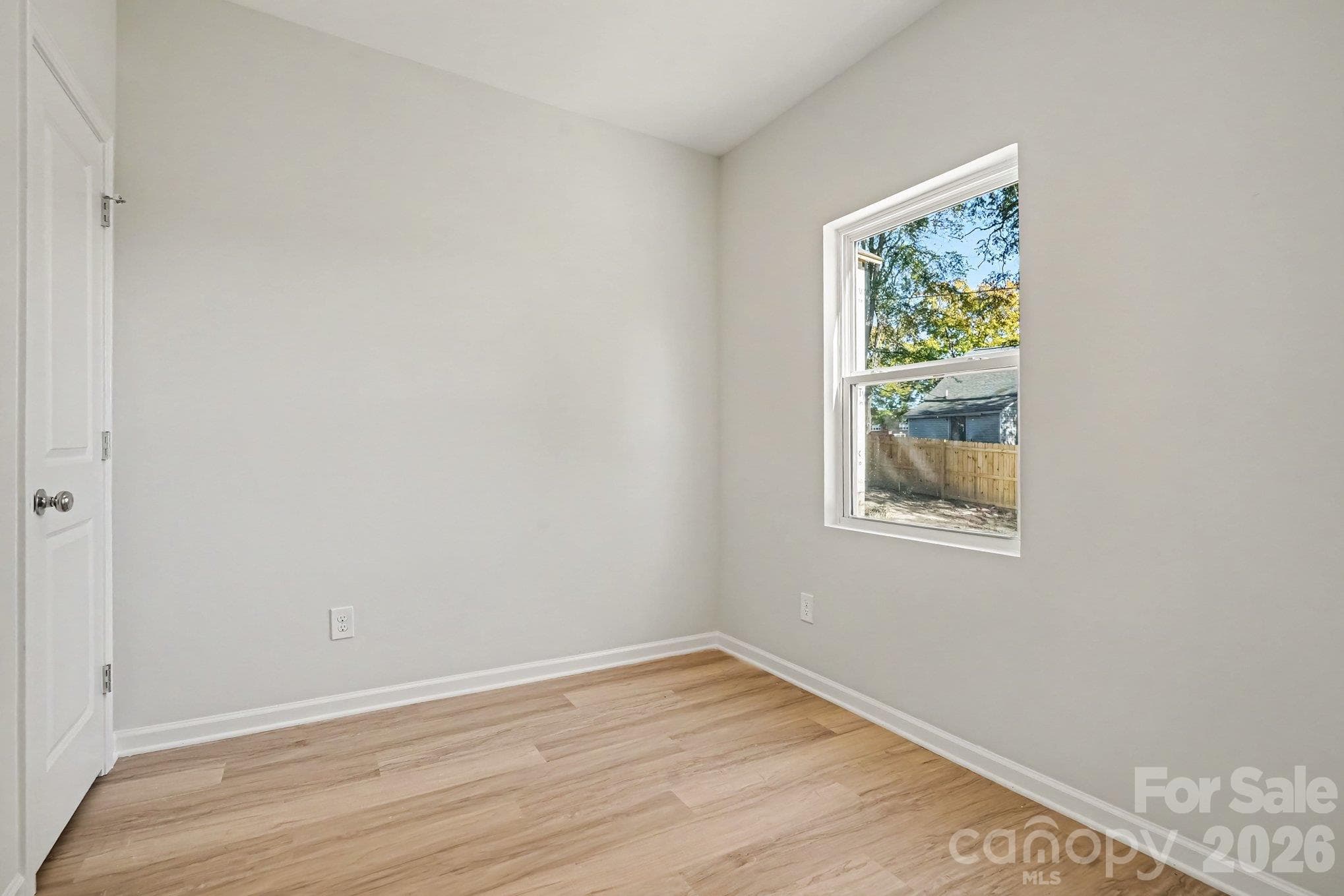 Office with empty view on man level. Great for remote work, toy too, craft / hobby room, or storage. - 121 Buffalo Avenue NW, Concord