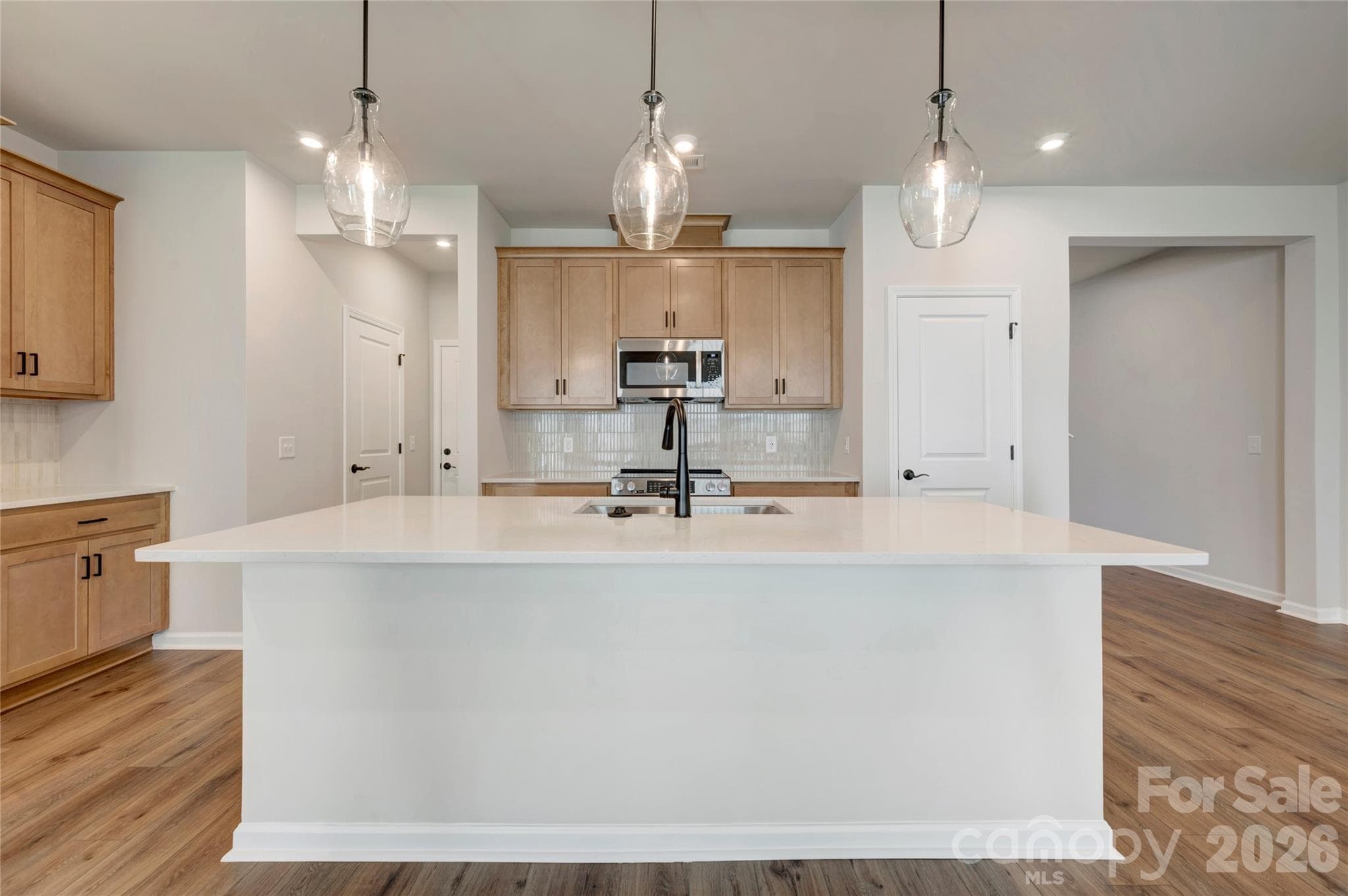 Light filled kitchen with ample storage - 707 Bowery Place, Cramerton