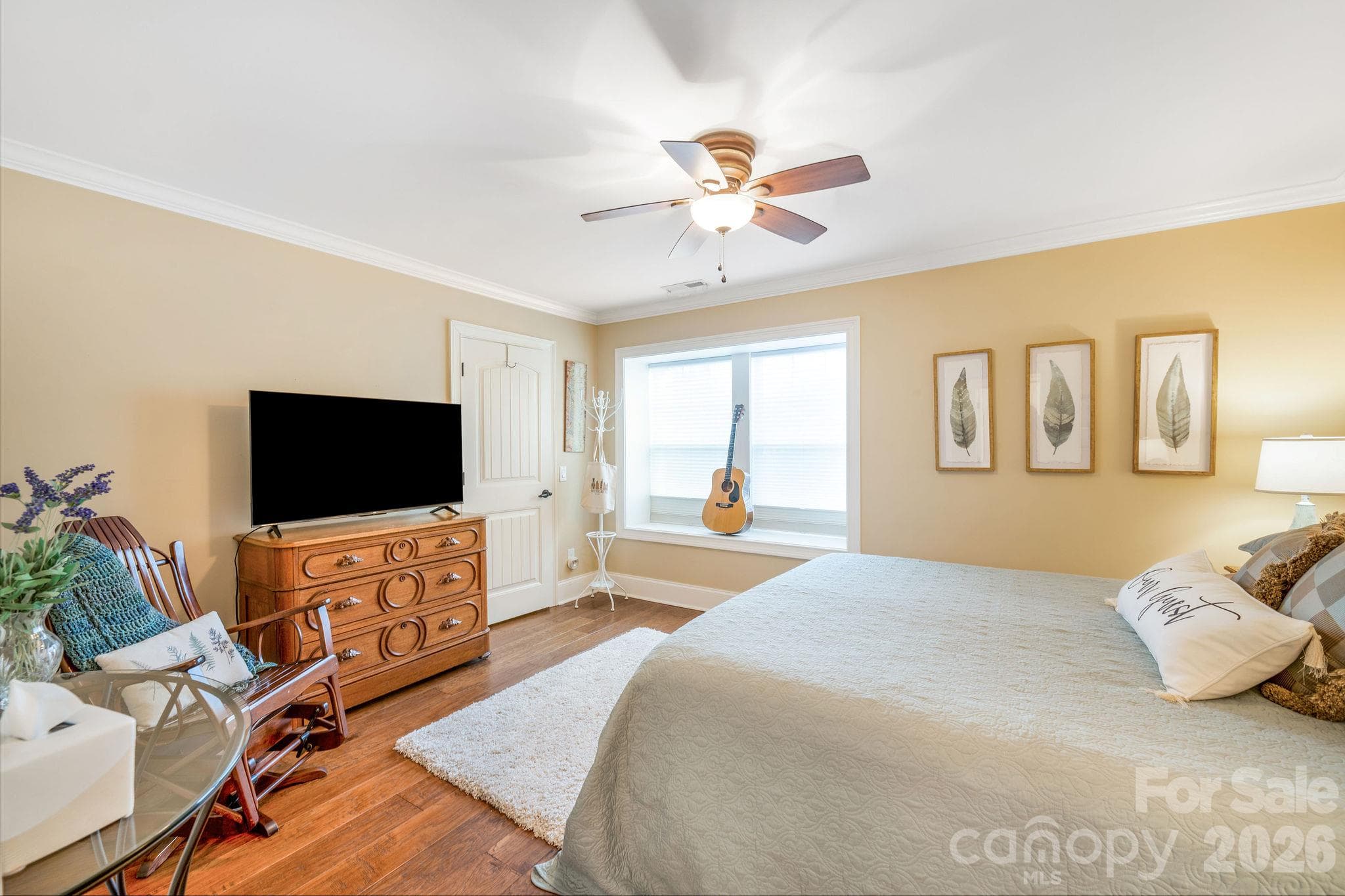 Comfortable bedroom with hardwood floors and abundant natural light - 28 Penley Park Drive, Weaverville