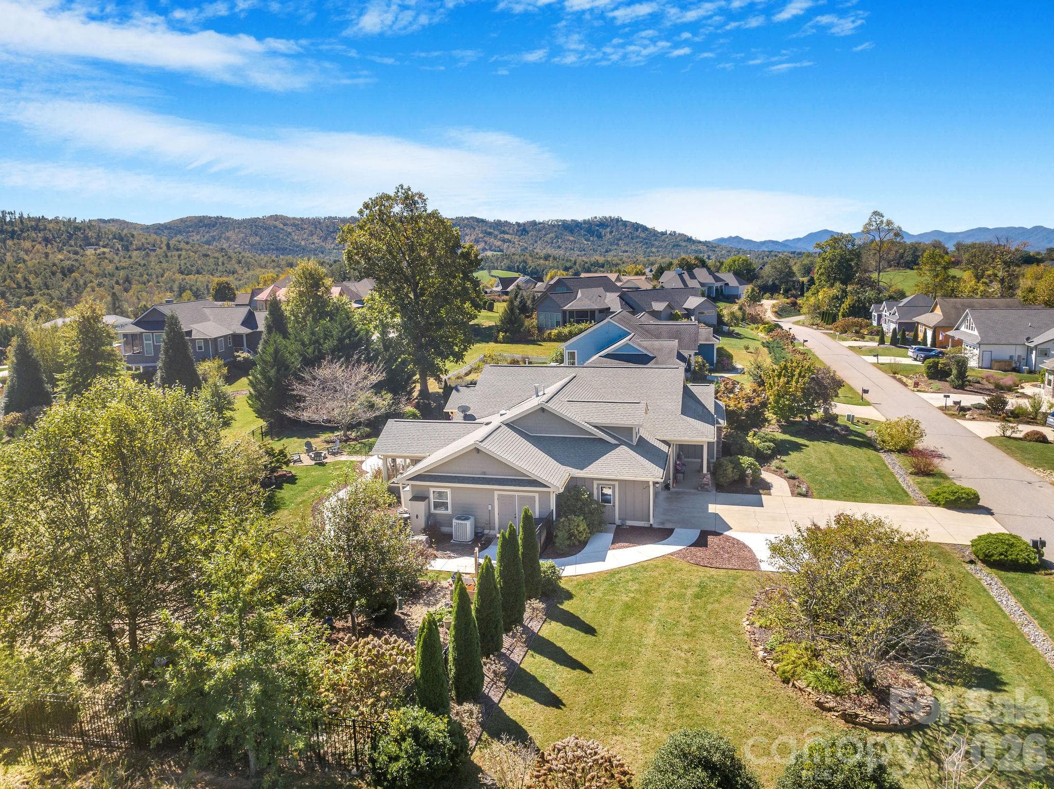 Welcoming exterior with mature landscaping and expansive front lawn - 28 Penley Park Drive, Weaverville