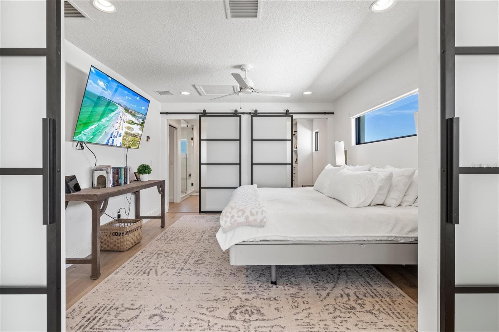 Primary suite sitting room with views of the river. - 1914 RIVERSIDE DR E, BRADENTON