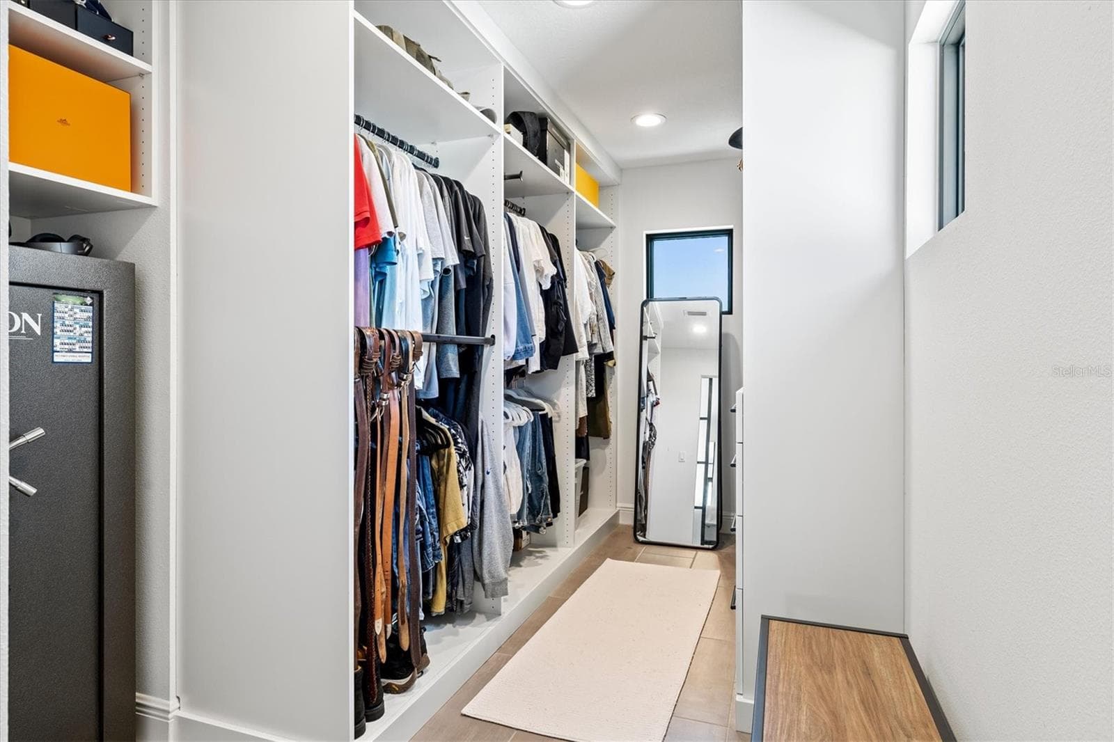 Primary walk-in closet. - 1914 RIVERSIDE DR E, BRADENTON