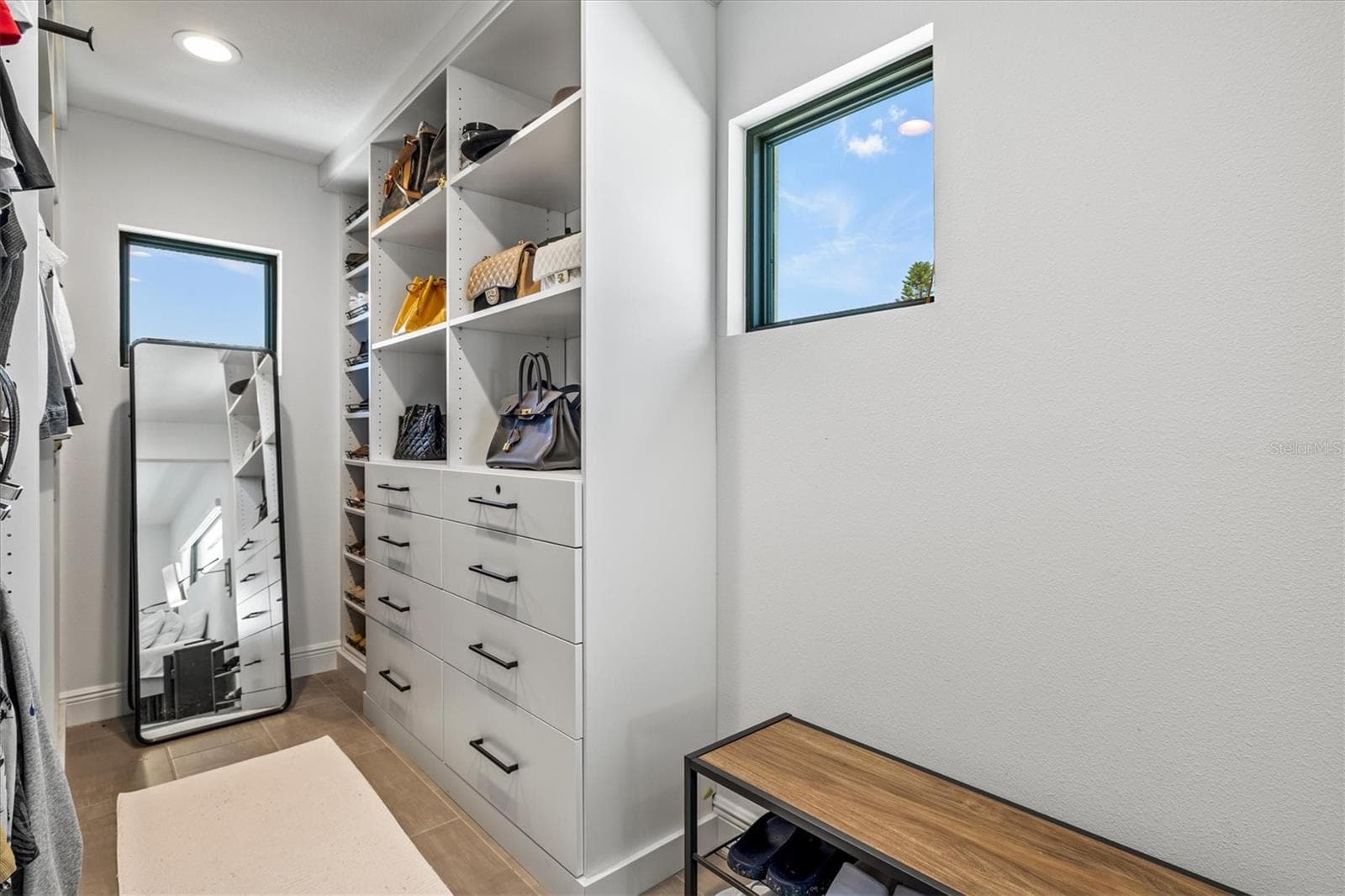 Primary walk-in closet. - 1914 RIVERSIDE DR E, BRADENTON
