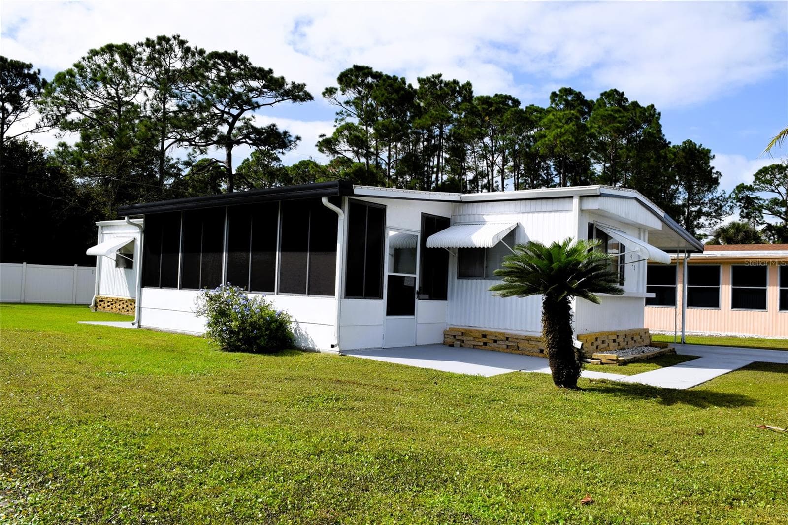 Mobile Home at 928 BLUE HERON BLVD, OSTEEN, photo 20 of 22
