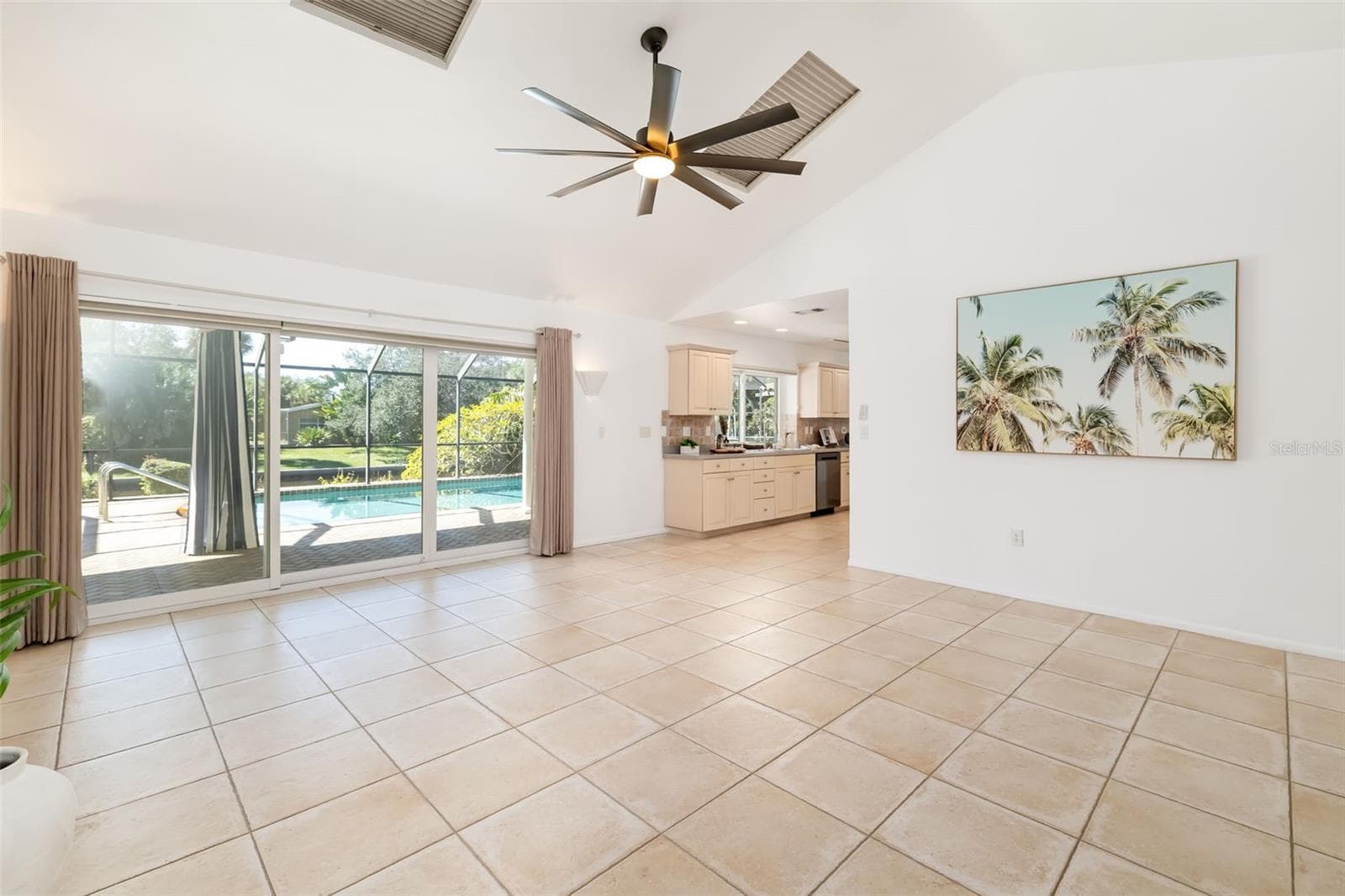 Great room looking out to pool & Kitchen - 5456 AZURE WAY, SARASOTA