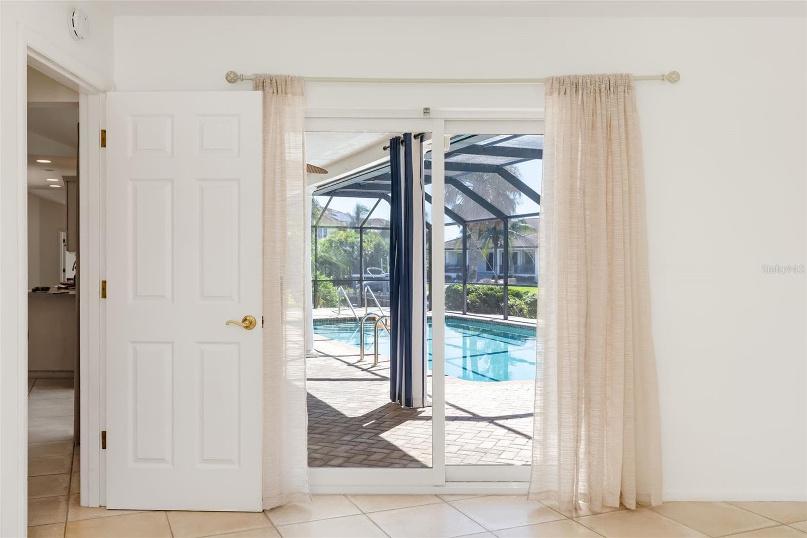 Second Bedroom slider out to pool - 5456 AZURE WAY, SARASOTA
