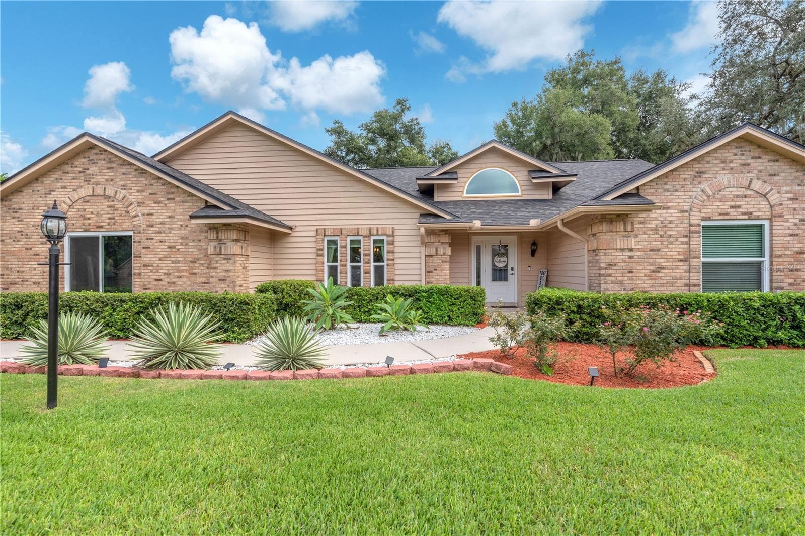 Welcome home to timeless elegance, classic charm and exceptional curb appeal. - 2421 OAK LANDING DR, BRANDON