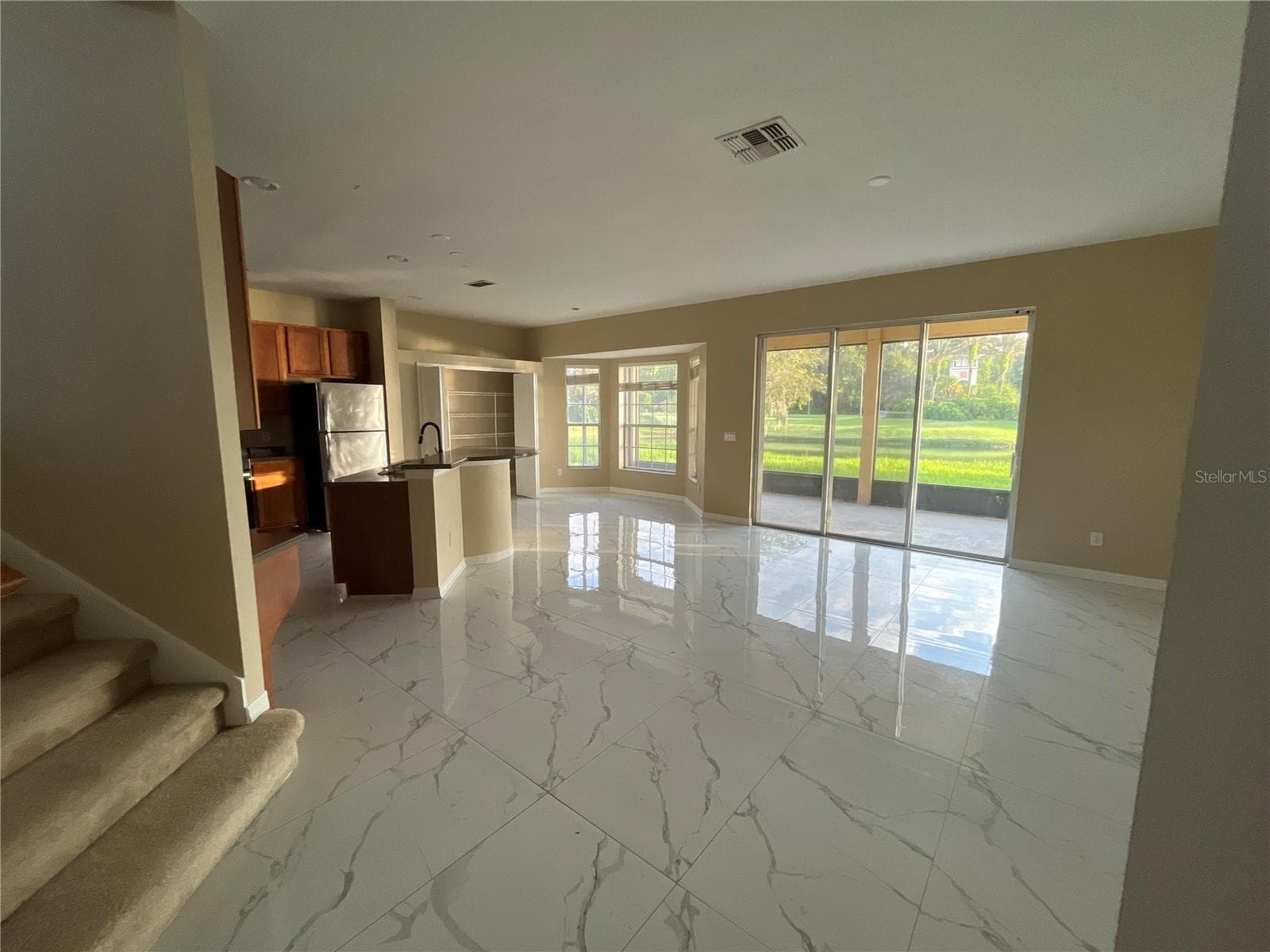 kitchen/living - 5803 CHESHIRE COVE TER, ORLANDO