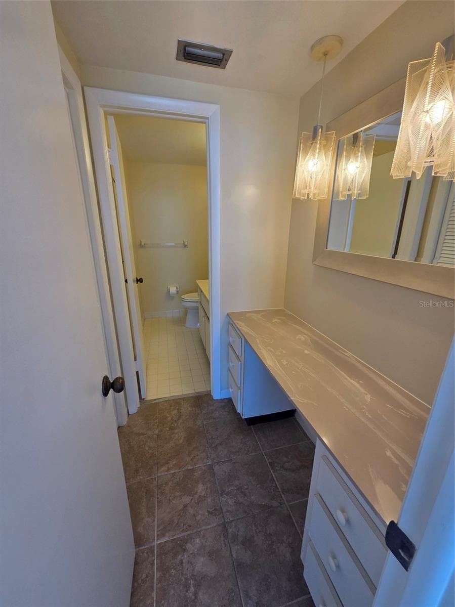 Owners bedroom vanity area - 7100 SUNSHINE SKYWAY LN S #301, ST PETERSBURG