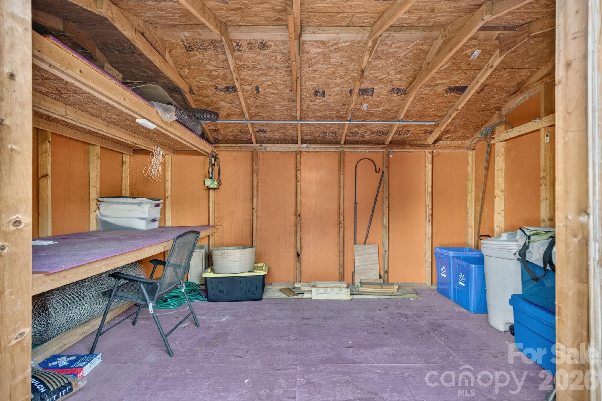 Detached outbuilding/shed providing fantastic additional storage, equipment space, or workshop potential. - 702 Painted Lady Court, Rock Hill