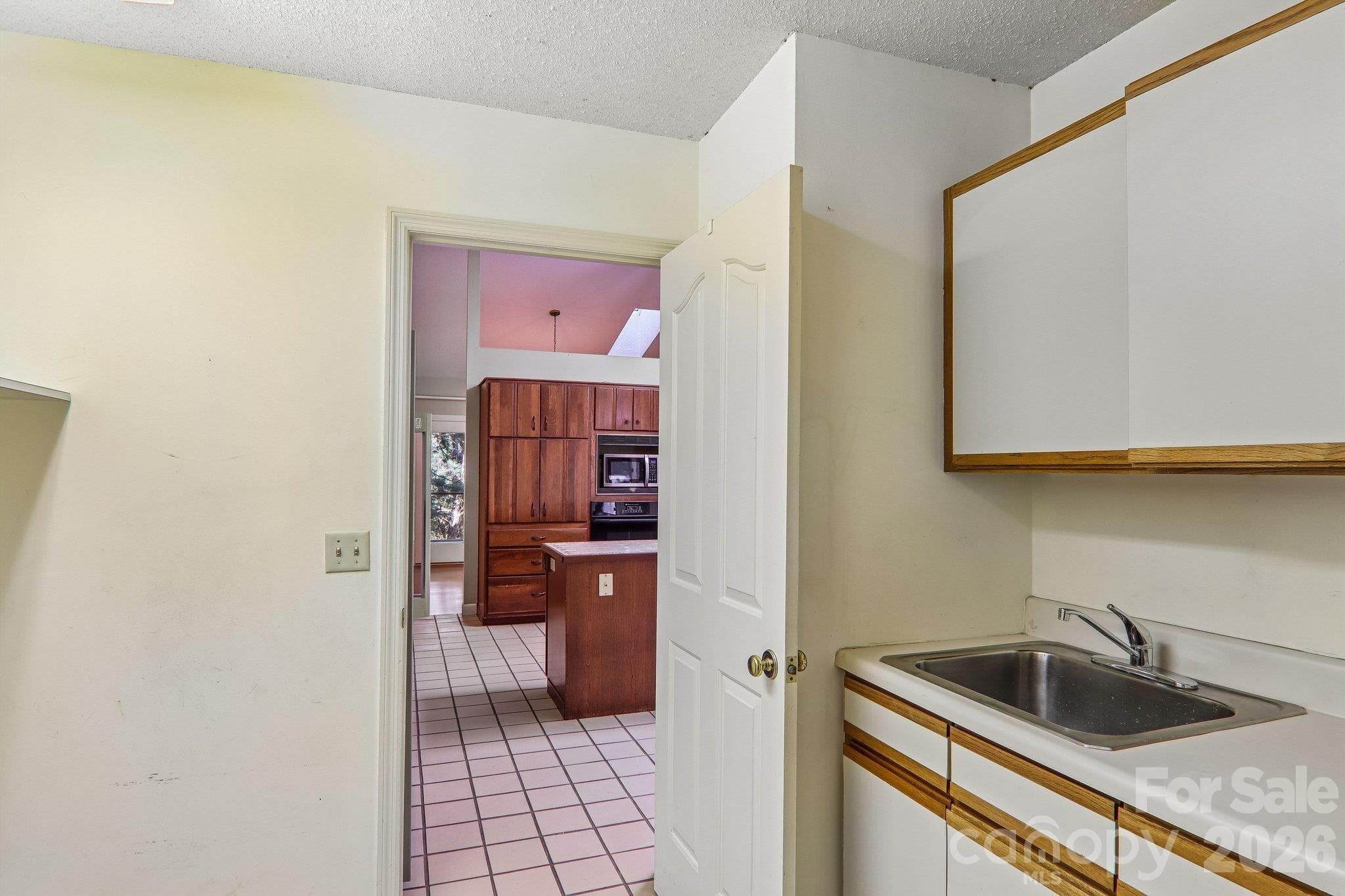 Laundry Room w/sink - 108 Kenwood Drive, Hendersonville