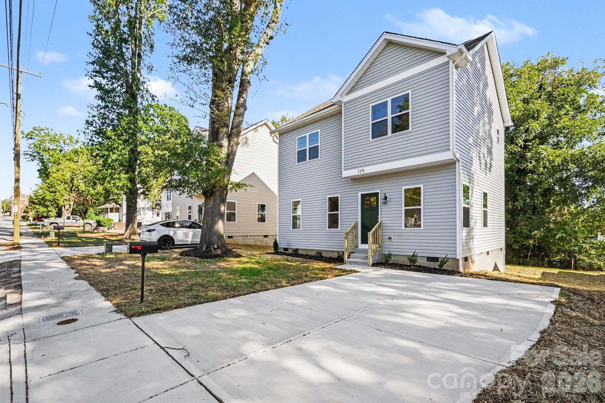 Concrete driveway space for 2 vehicles. - 125 Buffalo Avenue NW, Concord