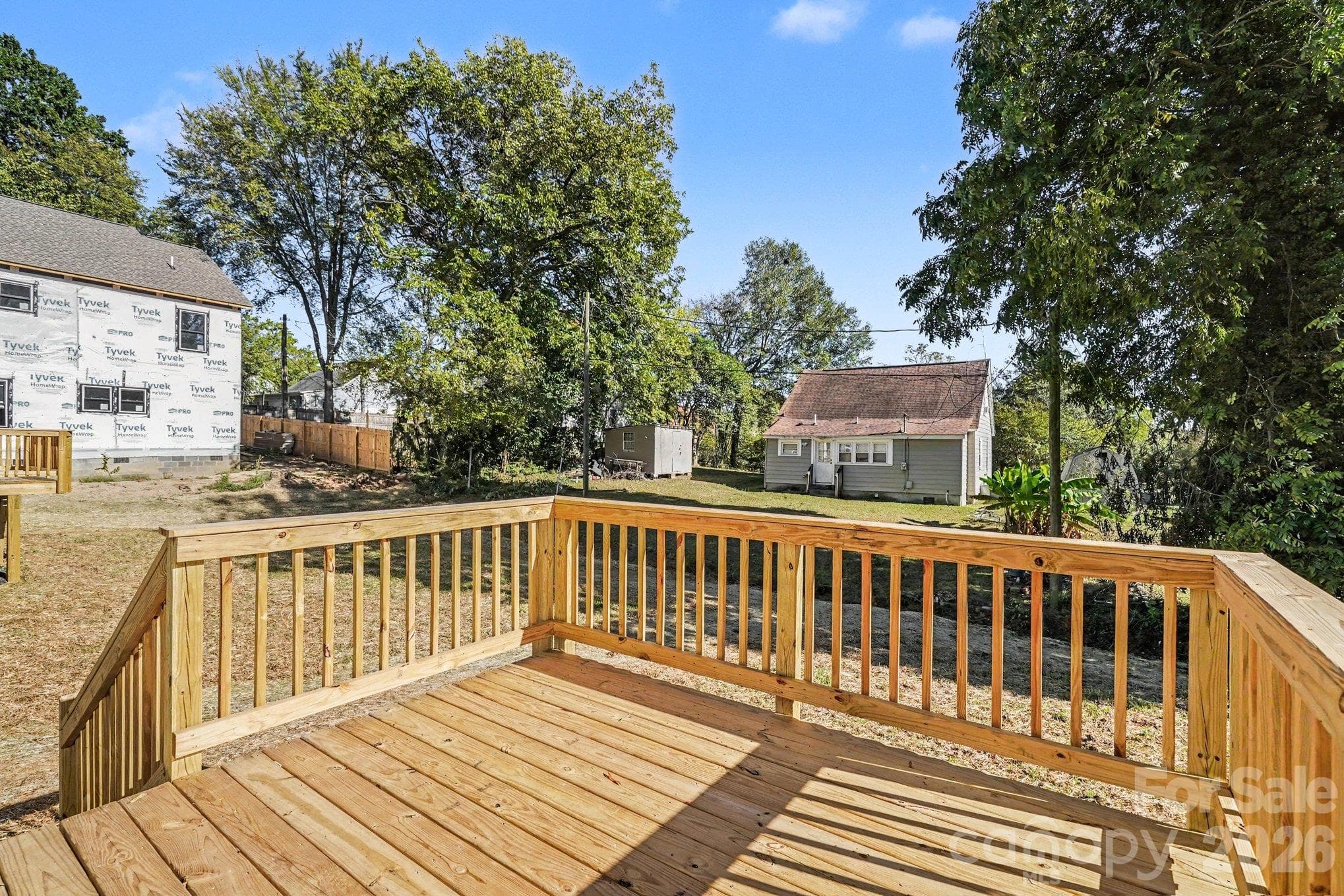 Wooden deck perfect for morning coffee and sunshine. - 125 Buffalo Avenue NW, Concord