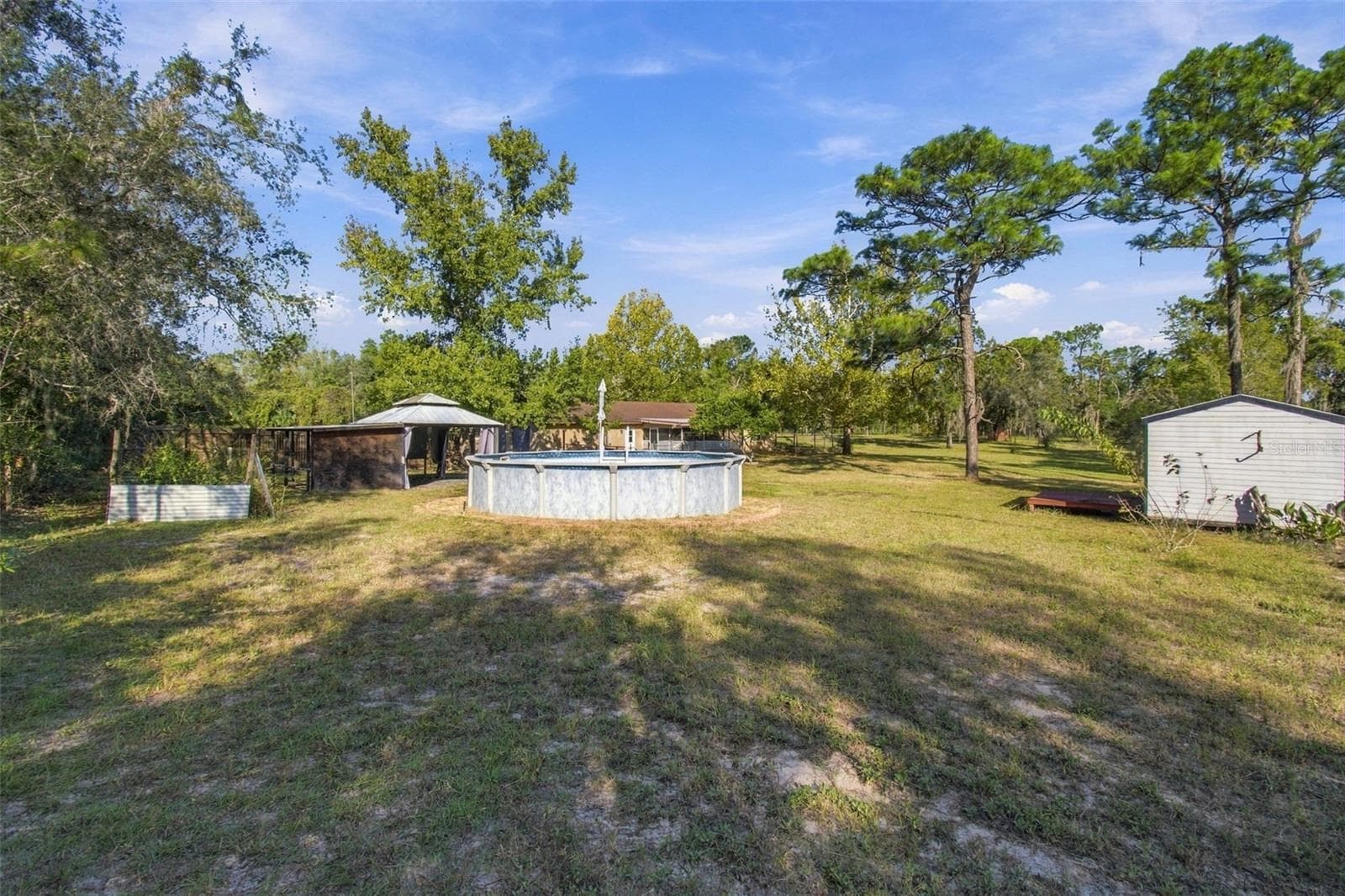 Single Family Residence at 12224 DRY CREEK RANCH RD, BROOKSVILLE, photo 33 of 34