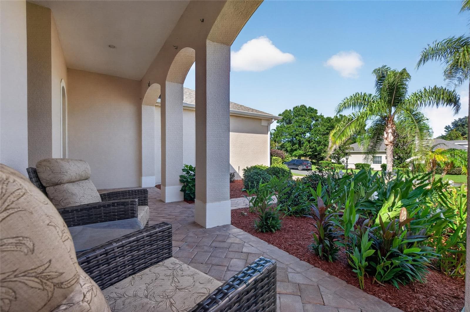 FRONT COVERED PORCH WITH.  COFFE HERE IN THE MORNING AND YOU CAN CATCH A GLIMPSE OF A POND. - 24151 BELLE MEDE DR, LEESBURG
