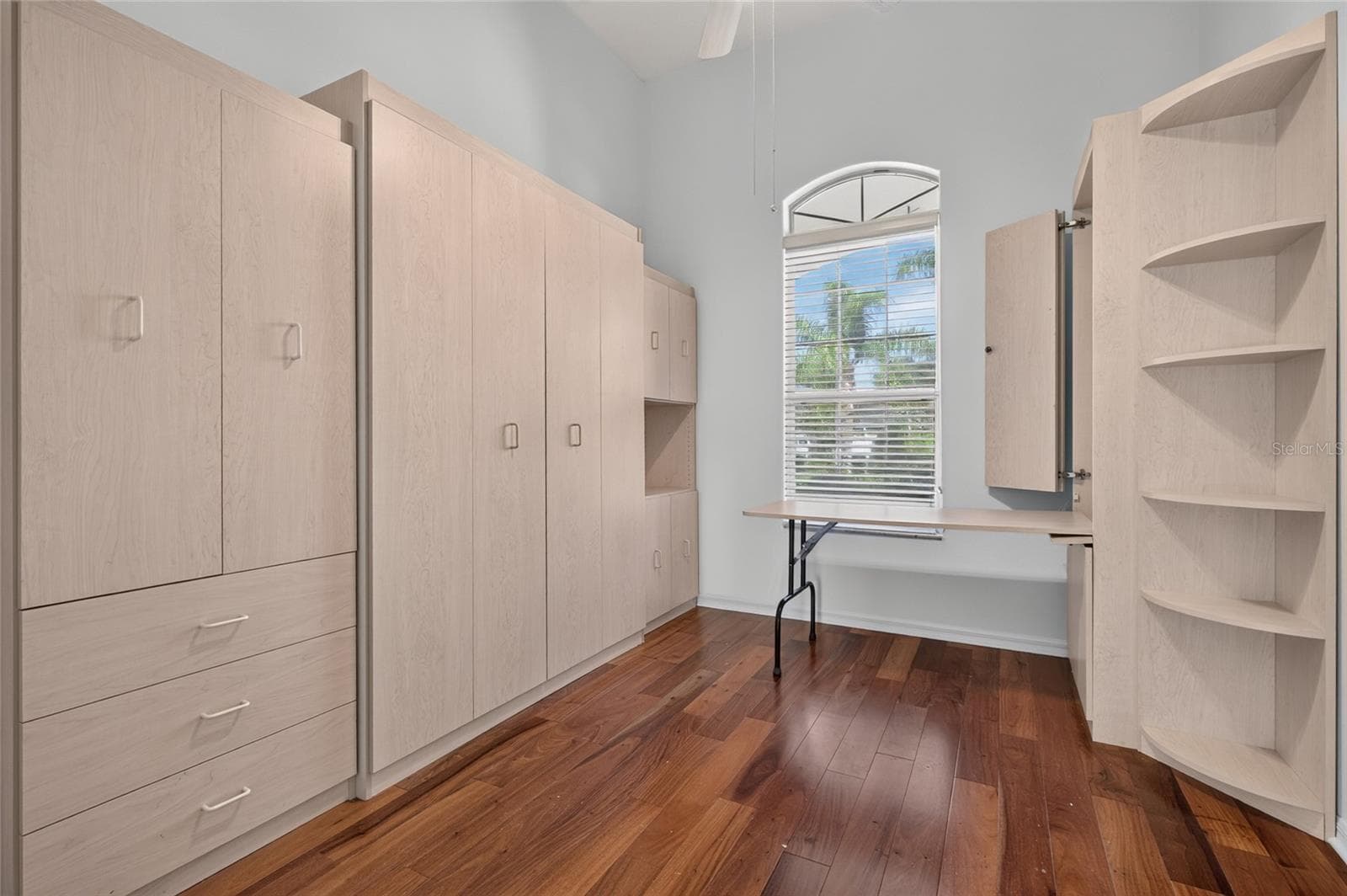THIRD BEDROOM/OFFICE. FUNCTION AT IT BEST CUSTOM BUILT IN. MURPHY  BED, DROP DOWN DESK, AND STORGE CLOSET AND DRAWERS. - 24151 BELLE MEDE DR, LEESBURG