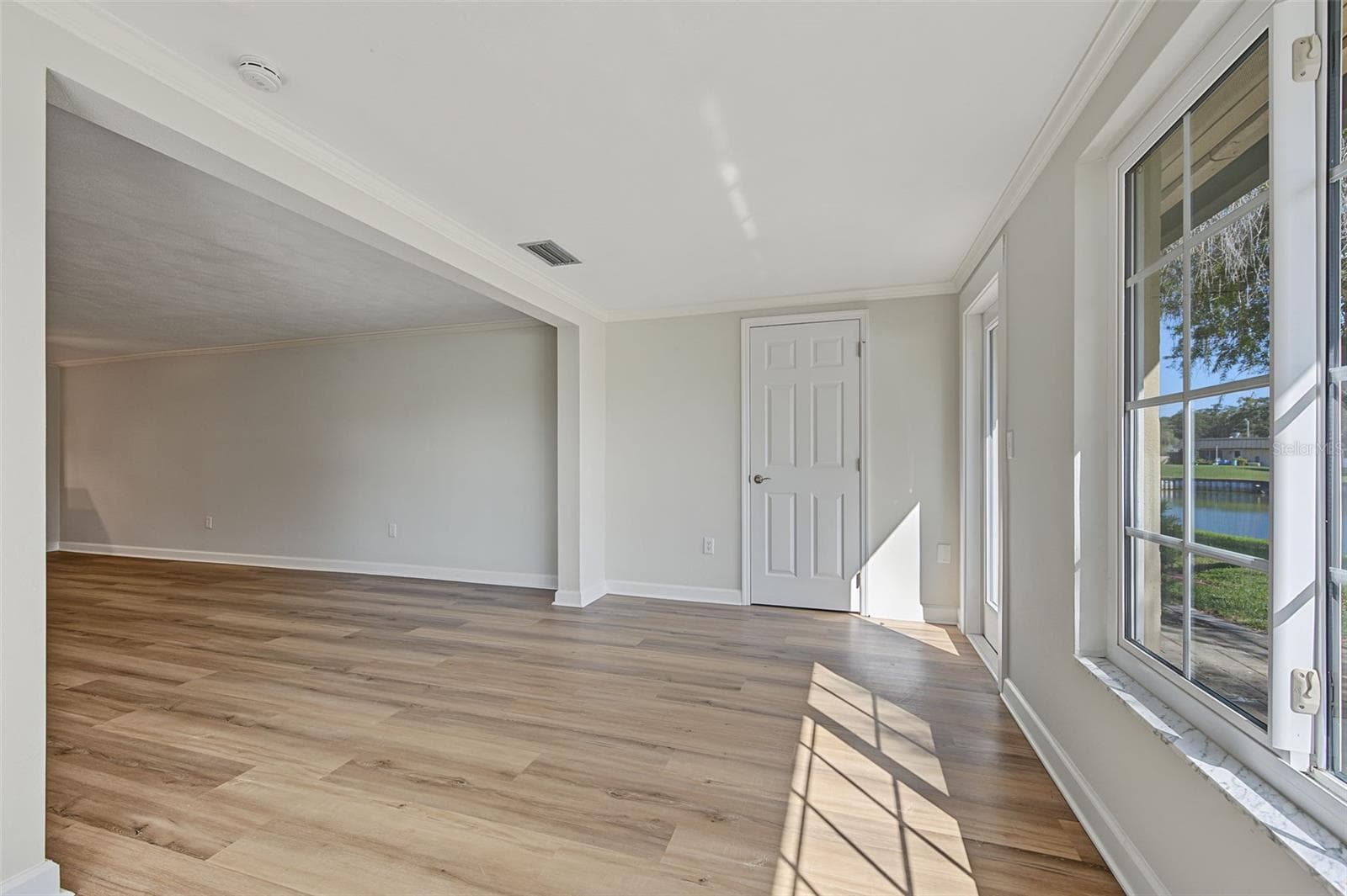 Florida Room - View of the common area pond - 4364 SUMMERSUN DR, NEW PORT RICHEY