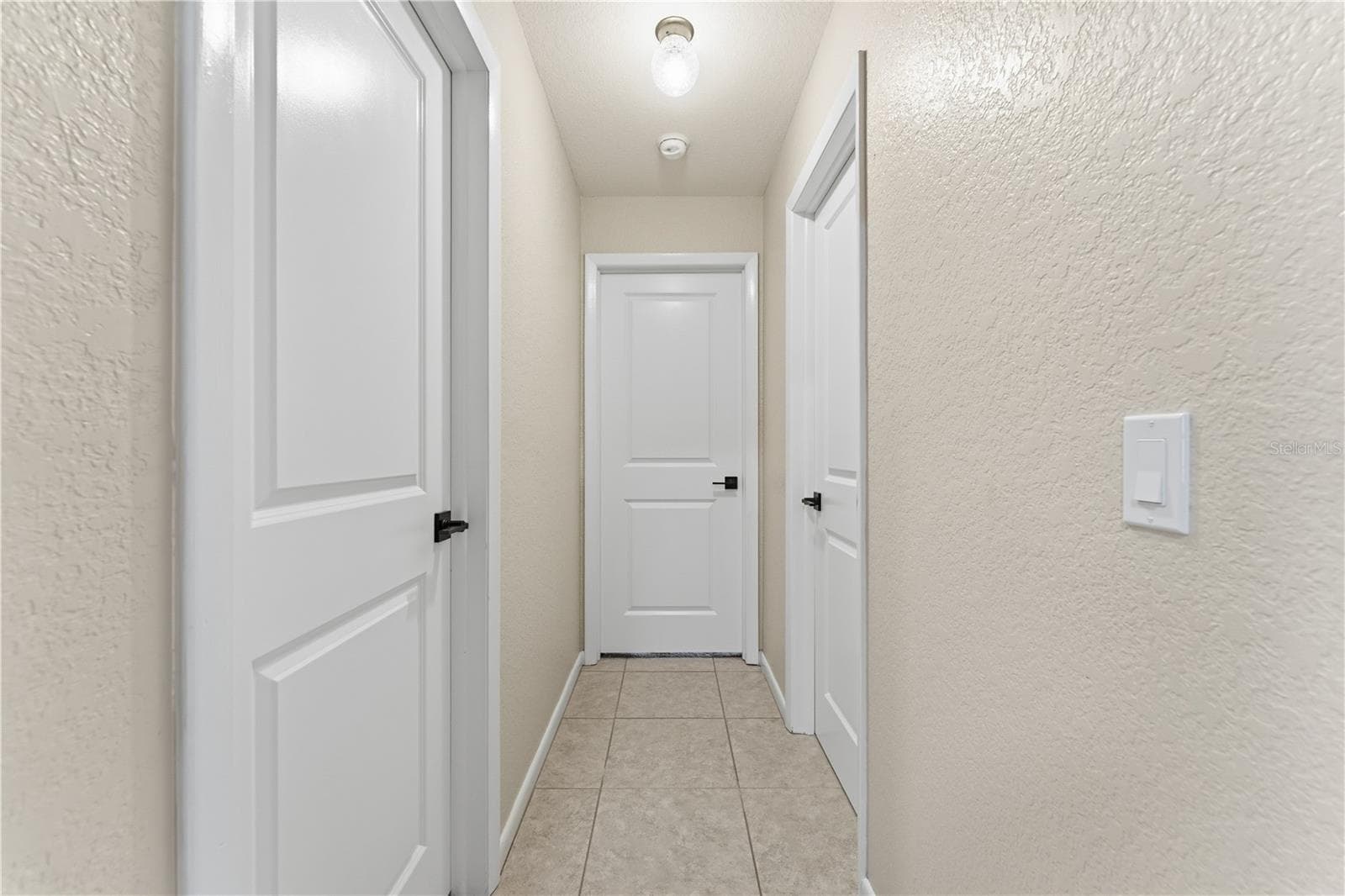 VEIW TO BACK ROOMS ALL NEW DOORS - 1478 NAVIGATOR RD, PUNTA GORDA