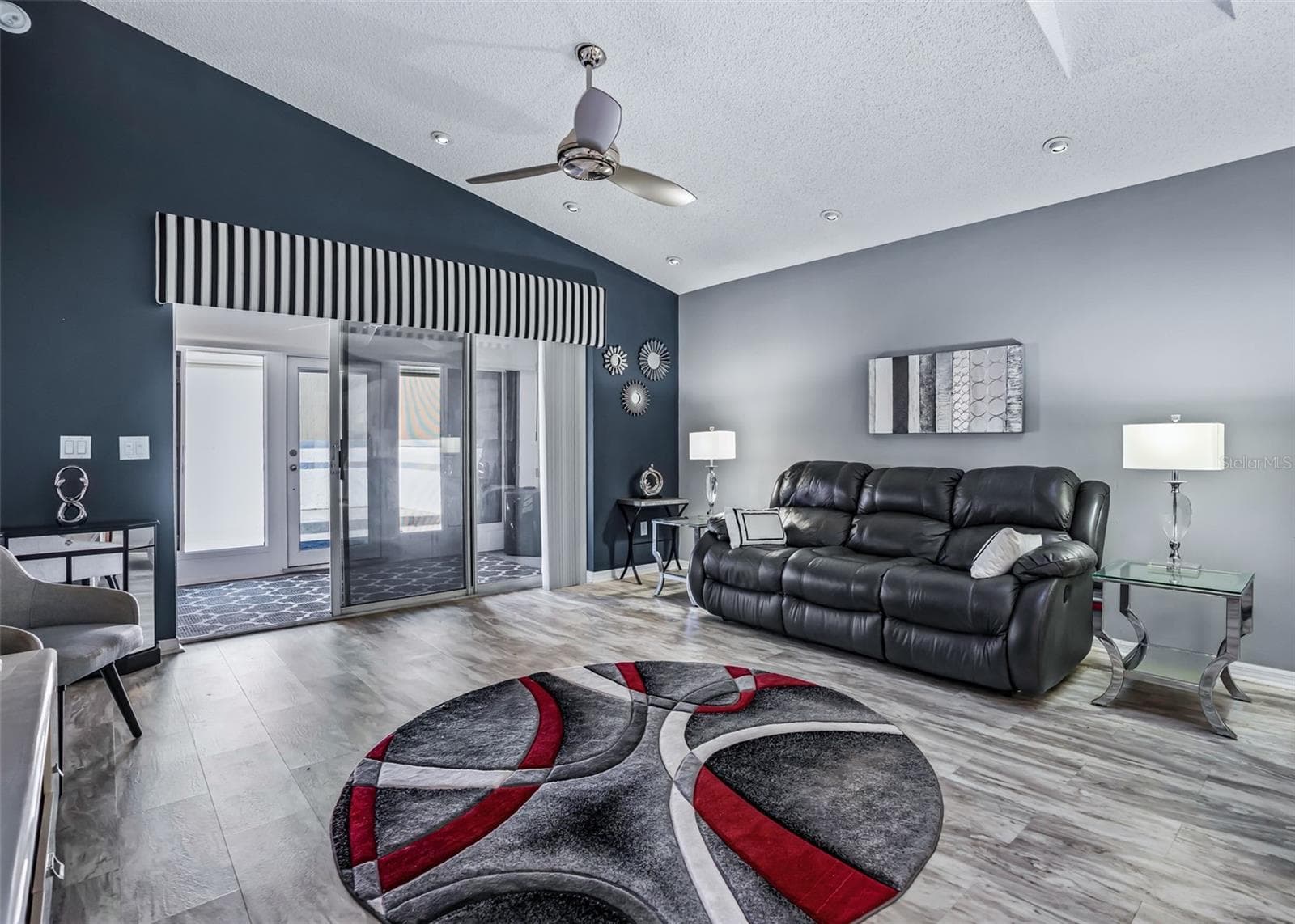 This ceiling fan will be replaced with a blak one. Luxury floors throughout - 17864 SE 115TH CT, SUMMERFIELD