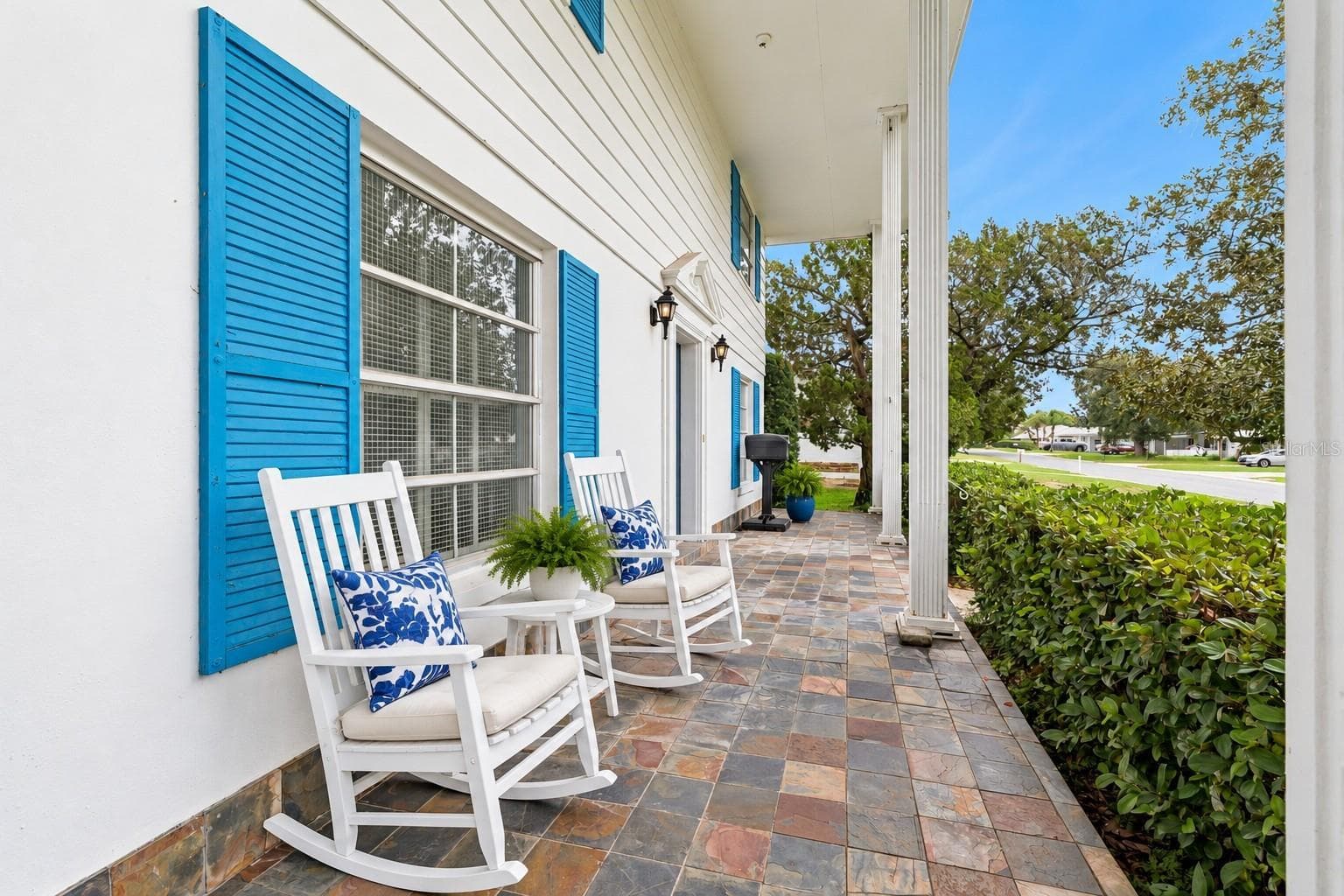 Virtual staged, Front Porch with Slate Tile Flooring - 803 HILLSIDE AVE, LAKE WALES