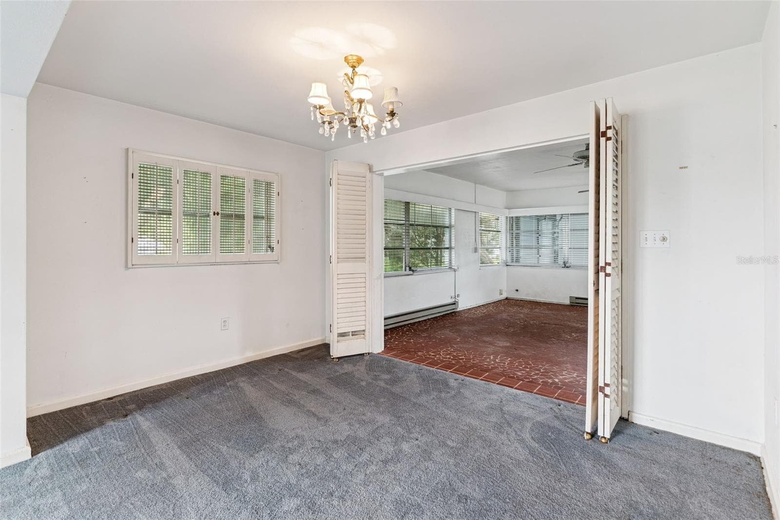 Formal Dining Room flows into the four season room - 803 HILLSIDE AVE, LAKE WALES