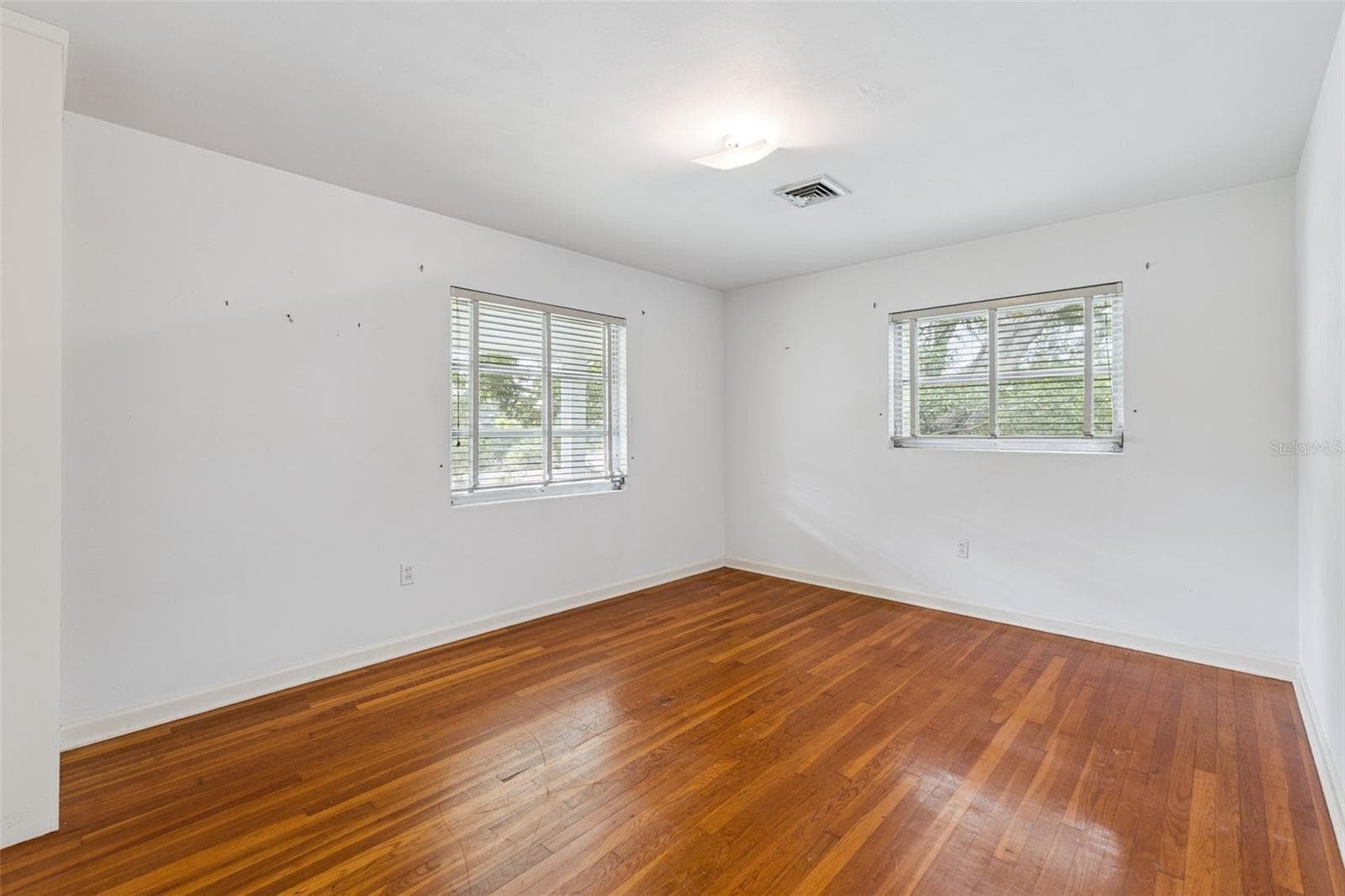 Bedroom #4 with hardwood flooring - 803 HILLSIDE AVE, LAKE WALES