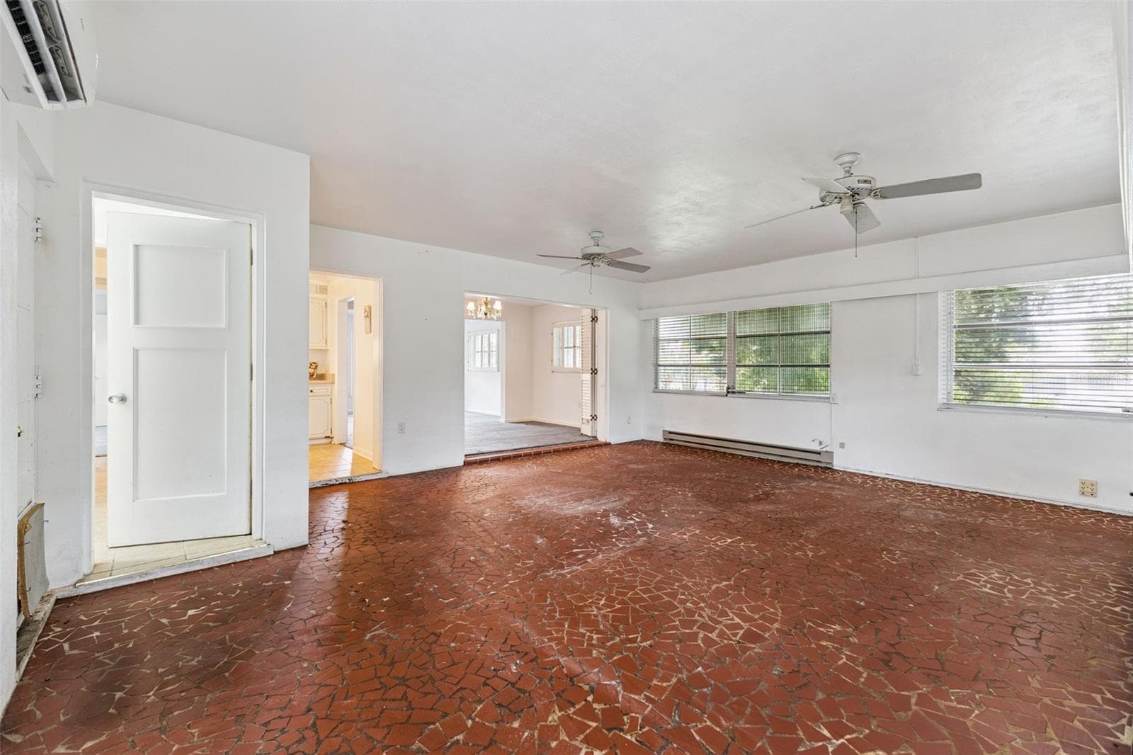 For larger gatherings, the generously sized four-season room overlooks the lushly landscaped yard and provides additional space for entertaining. - 803 HILLSIDE AVE, LAKE WALES