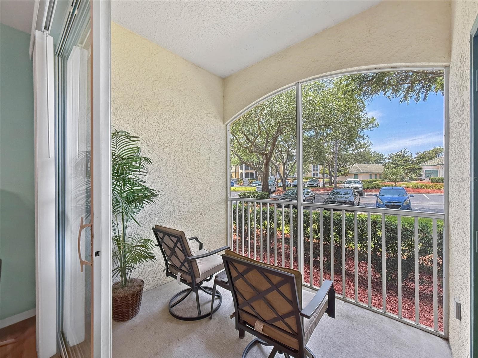 Screened porch and storage closet - 8815 DUNES CT #105, KISSIMMEE