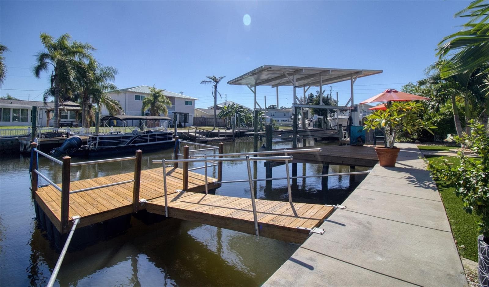 Covered boat lift & floating dock - 13734 SAN JUAN AVE, HUDSON