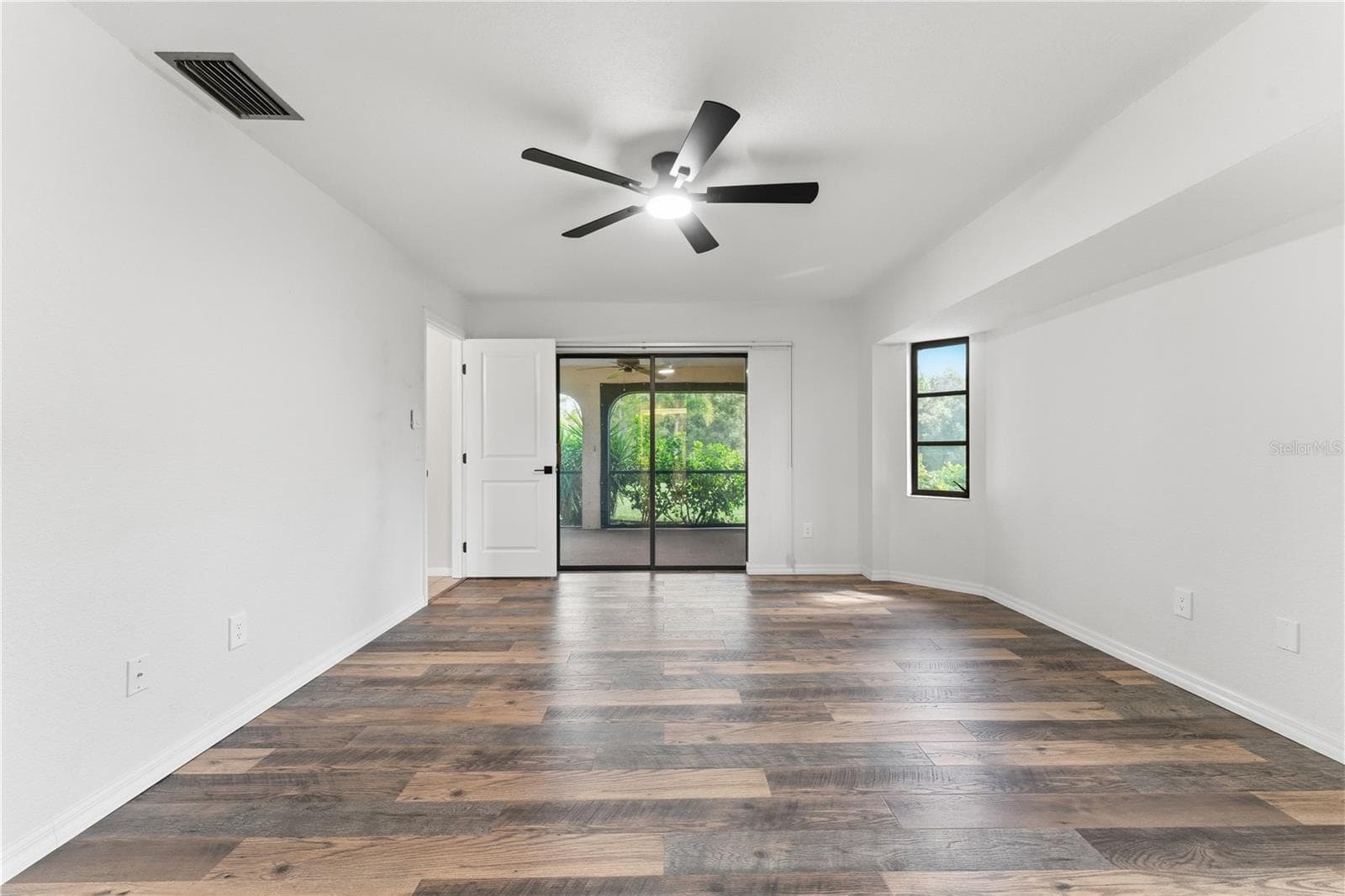 SLIDER TO BACK IN PRIMARY BEDROOM - 1478 NAVIGATOR RD, PUNTA GORDA