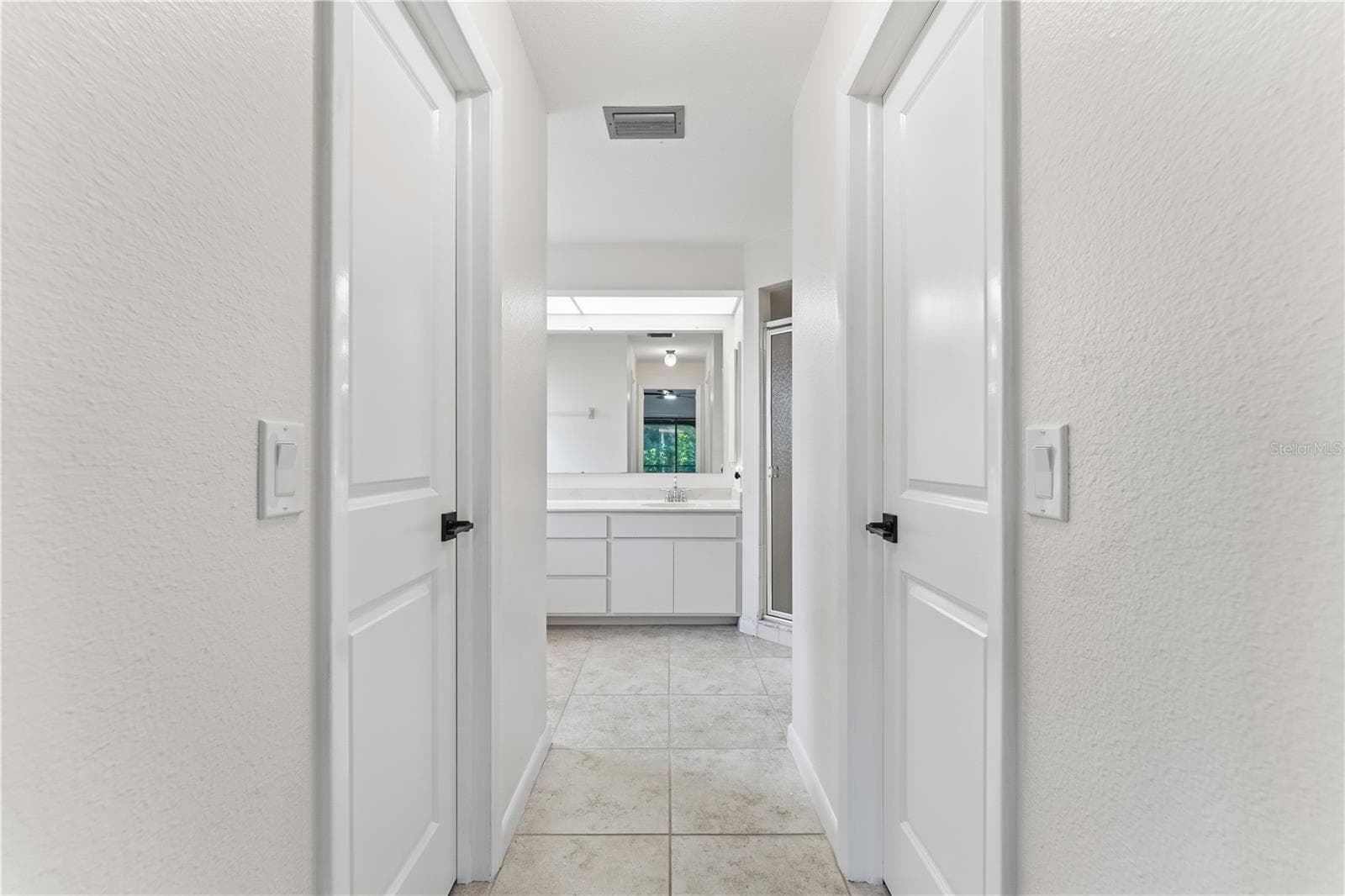 PRIMARY BEDROOM DUAL WALK IN CLOSETS - 1478 NAVIGATOR RD, PUNTA GORDA
