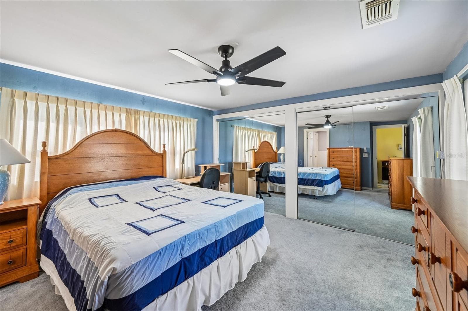 Primary Bedroom with wall-to-wall closet. - 8455 ALBATROSS LN, ENGLEWOOD