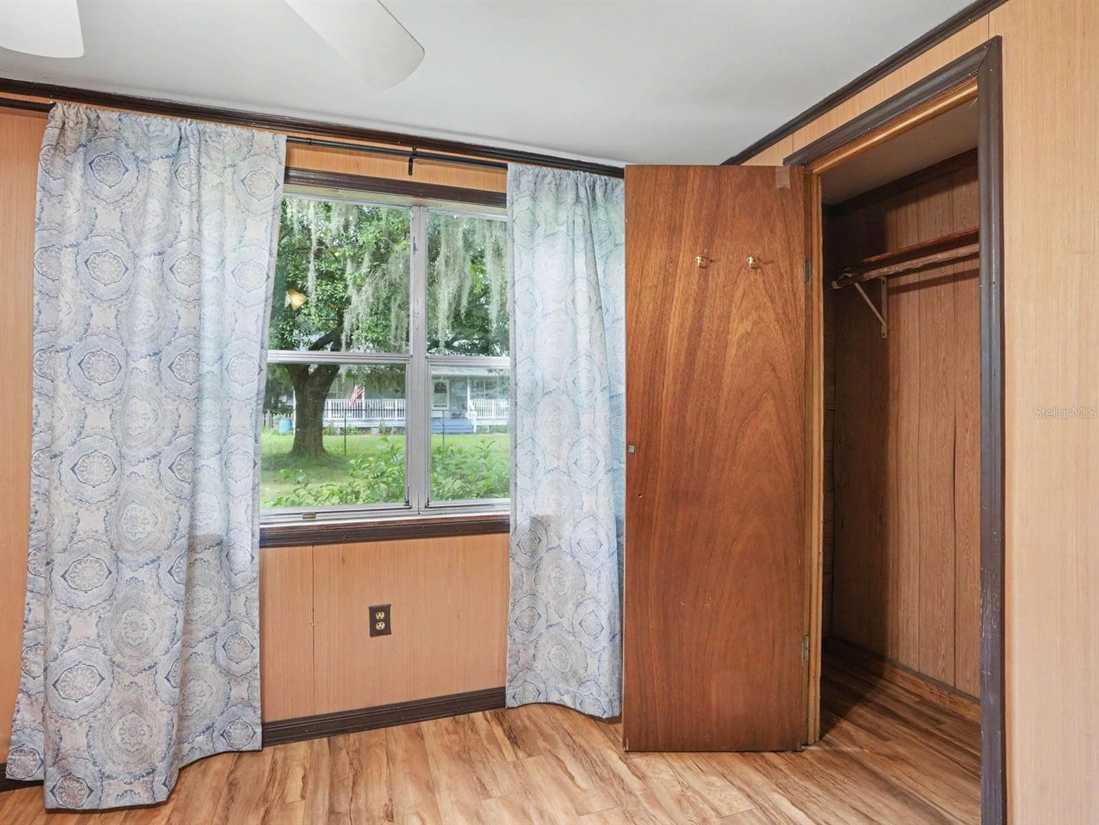 Bedroom with Wood Closet, Window Treatments & Access to Outdoor Spaces - 3015 STRAWBERRY LN, LAKELAND