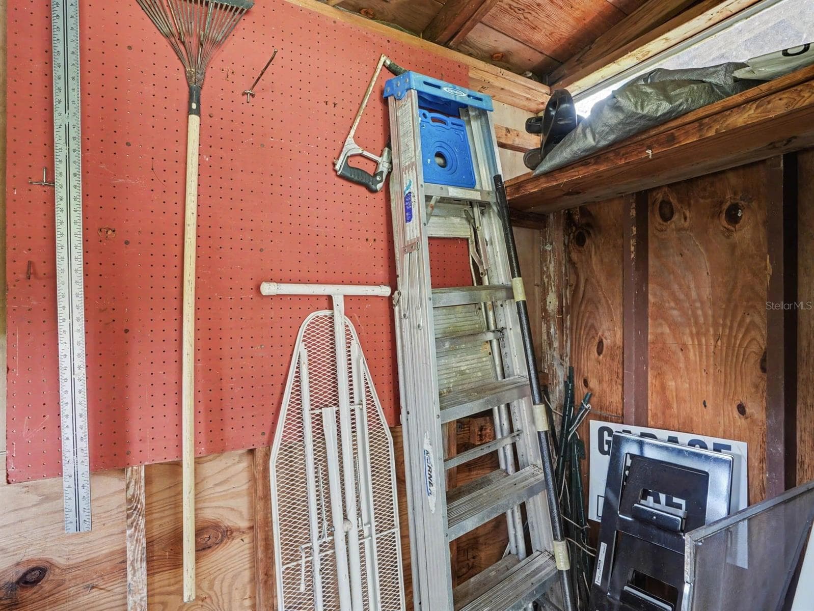 Workshop Storage with Pegboard, Ladder & Shelving Organization - 3015 STRAWBERRY LN, LAKELAND