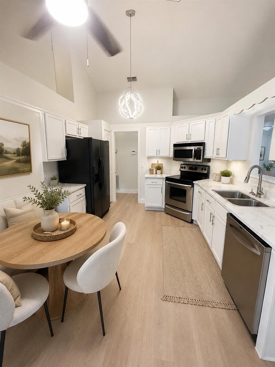Virtually staged Kitchen - 1901 KNOLTON AVE, ORANGE CITY