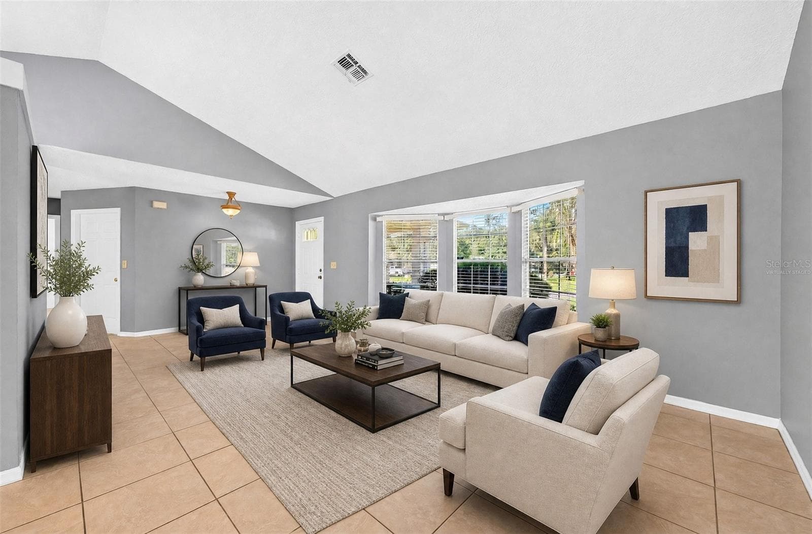 Formal living at the front of the home. Virtually Staged. - 32919 INDIAN WOODS DR, LEESBURG