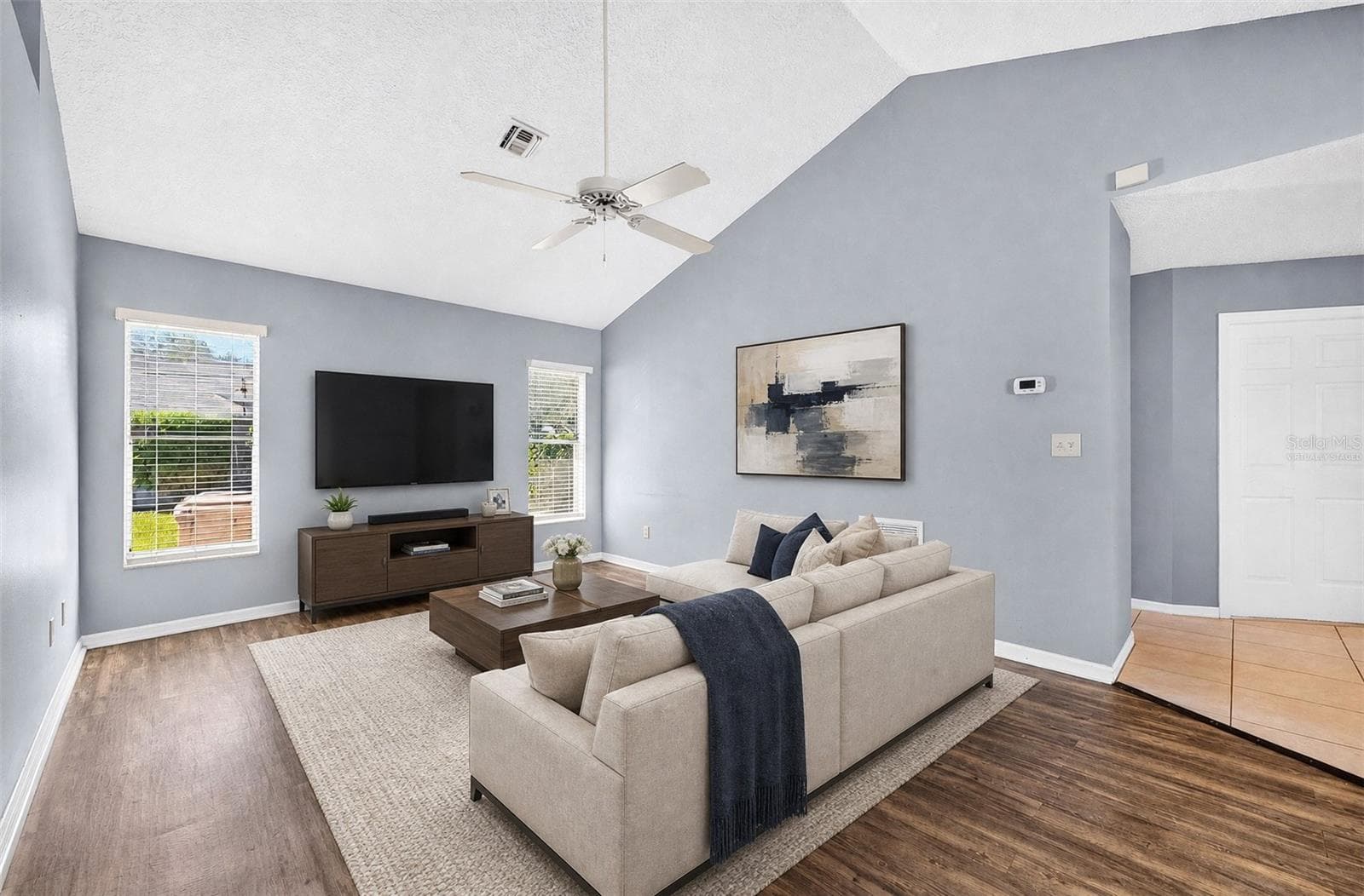 Light filled family room is the perfect gatheting space. Virtually Staged. - 32919 INDIAN WOODS DR, LEESBURG