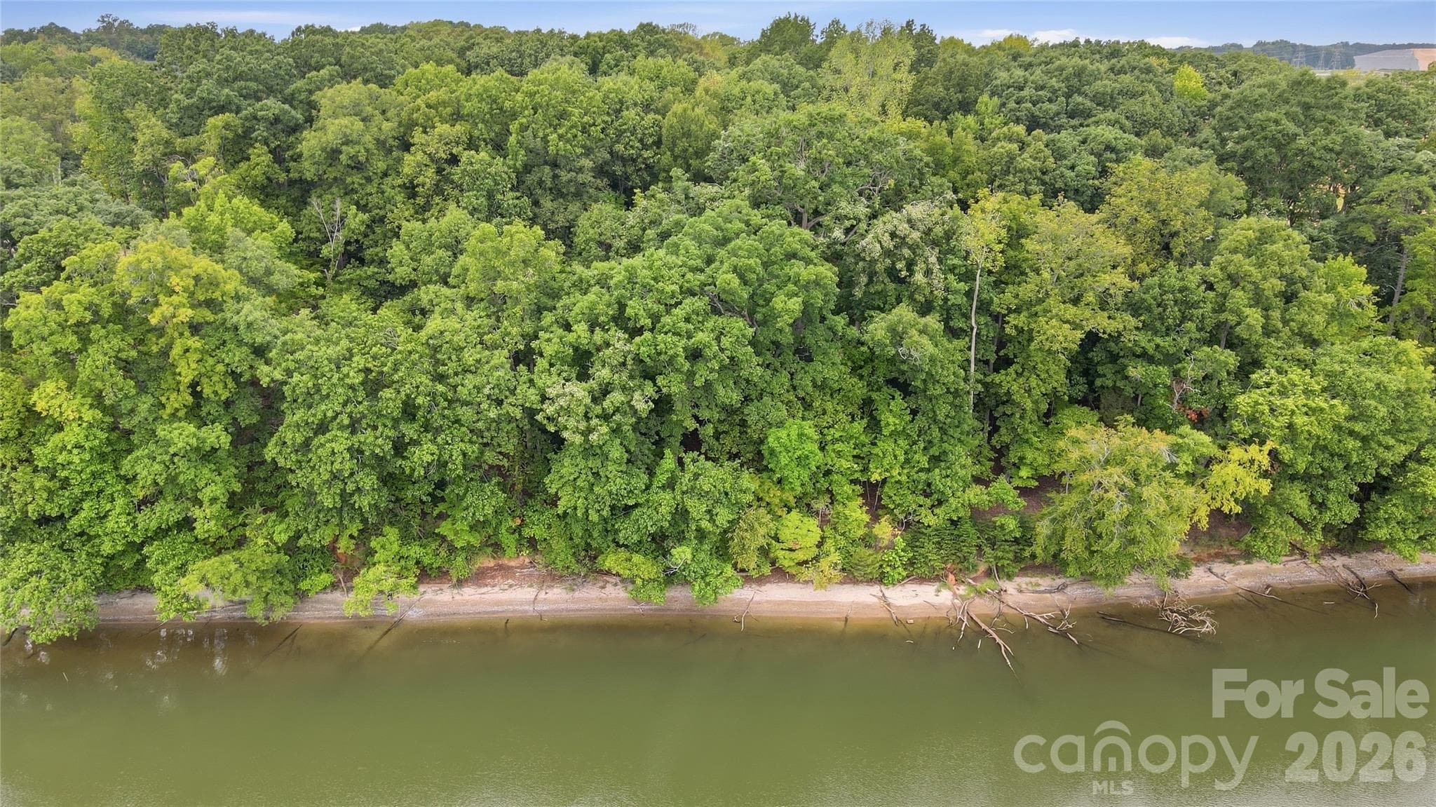 Approximately 103 feet of natural shoreline and expansive main-channel views that stretch for miles - 1029 Nutall Oak Lane, Belmont