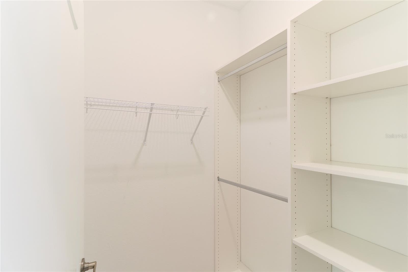 Primary closet - 2501 AVOLET CT, LAKEWOOD RANCH