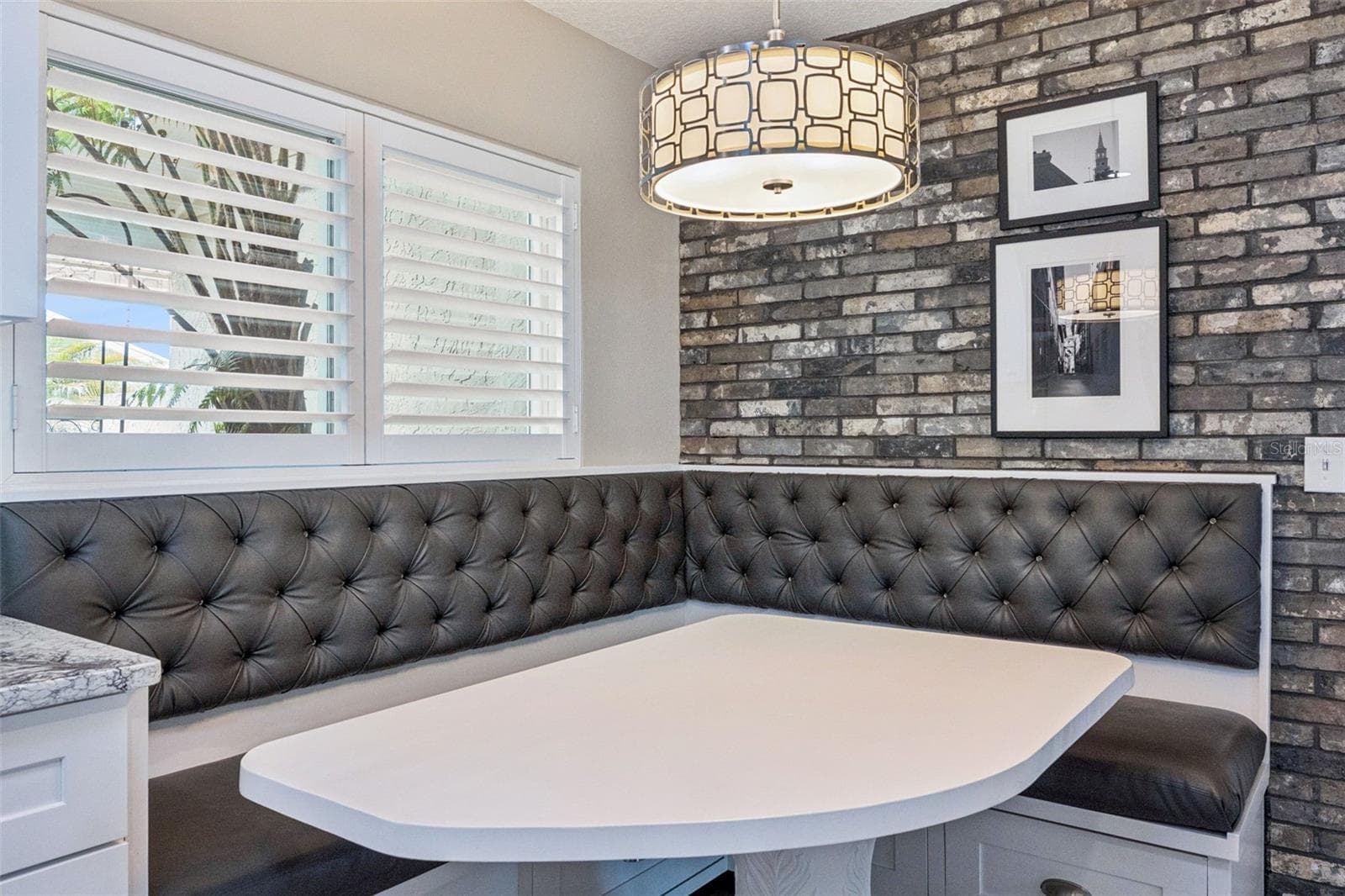 Custom built-in dining bench and table with storage. - 698 SAUSALITO BLVD, CASSELBERRY