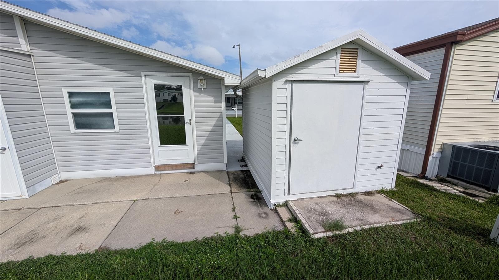 SHED AND OPEN PATIO - 207 CITRUS RIDGE DR, DAVENPORT