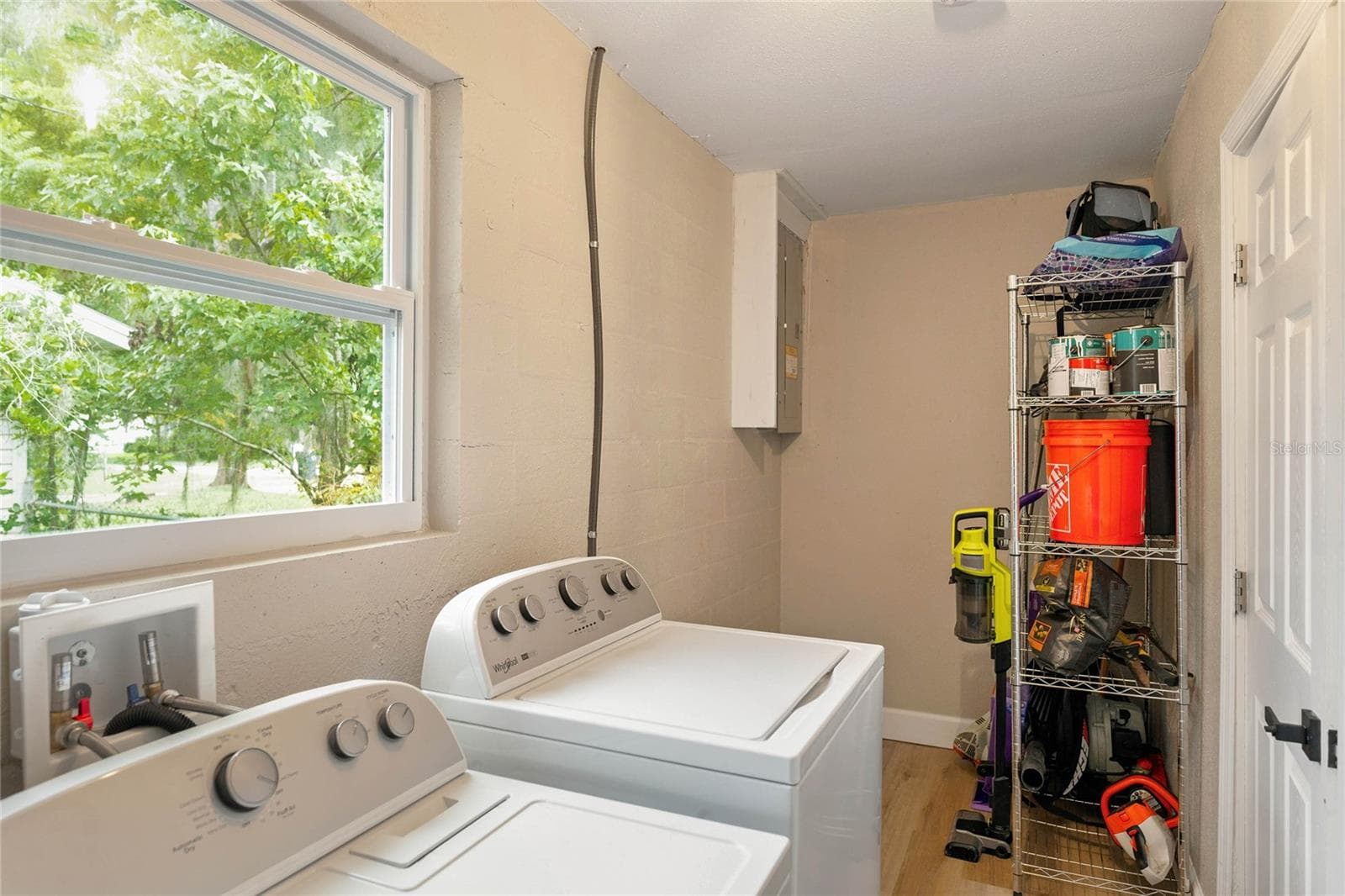 laundry room with storage space for pantry needs - 556 OLIVER DR, NEW SMYRNA BEACH