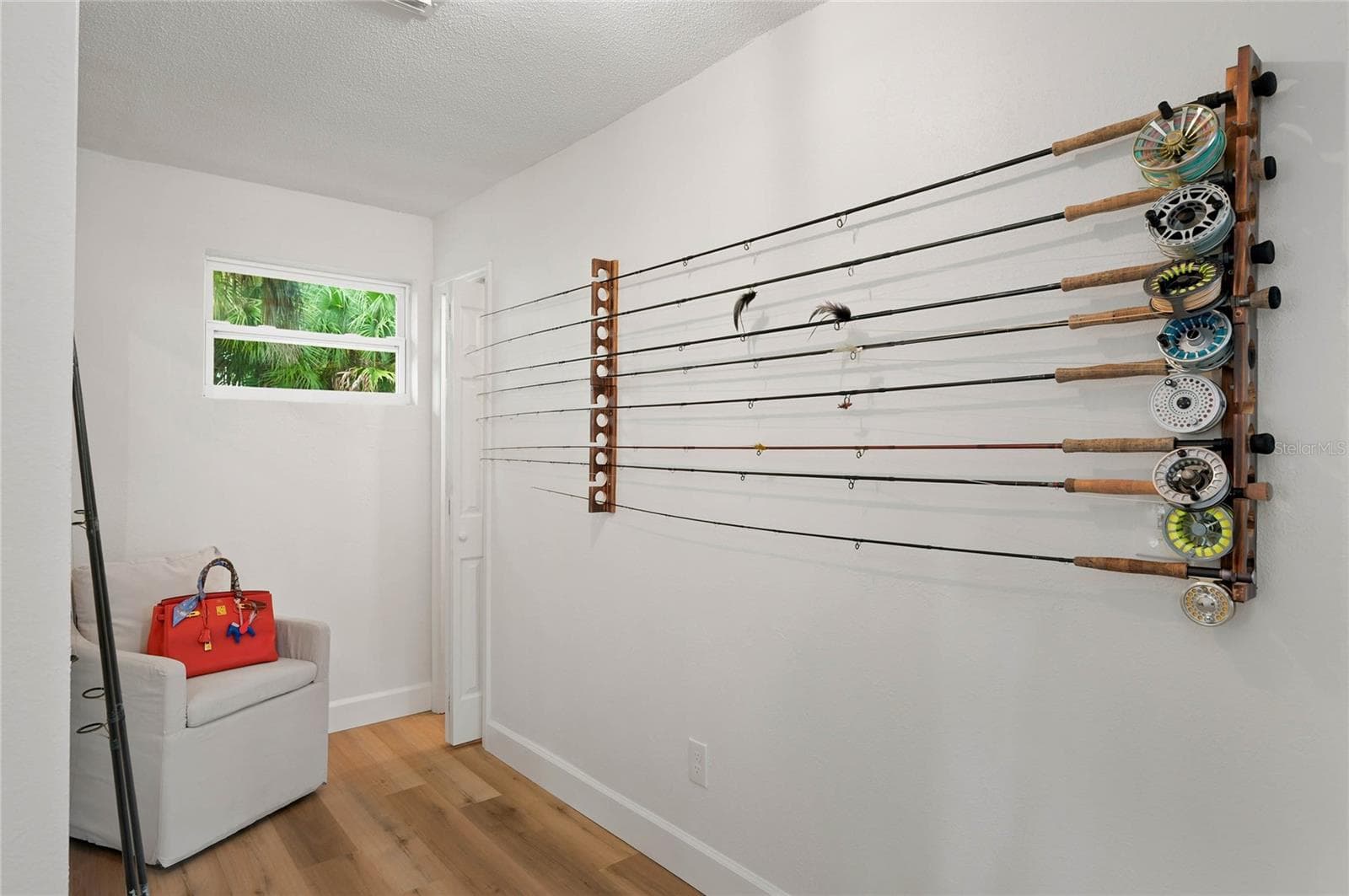 bonus space, door is a/c and extra storage inside - 556 OLIVER DR, NEW SMYRNA BEACH