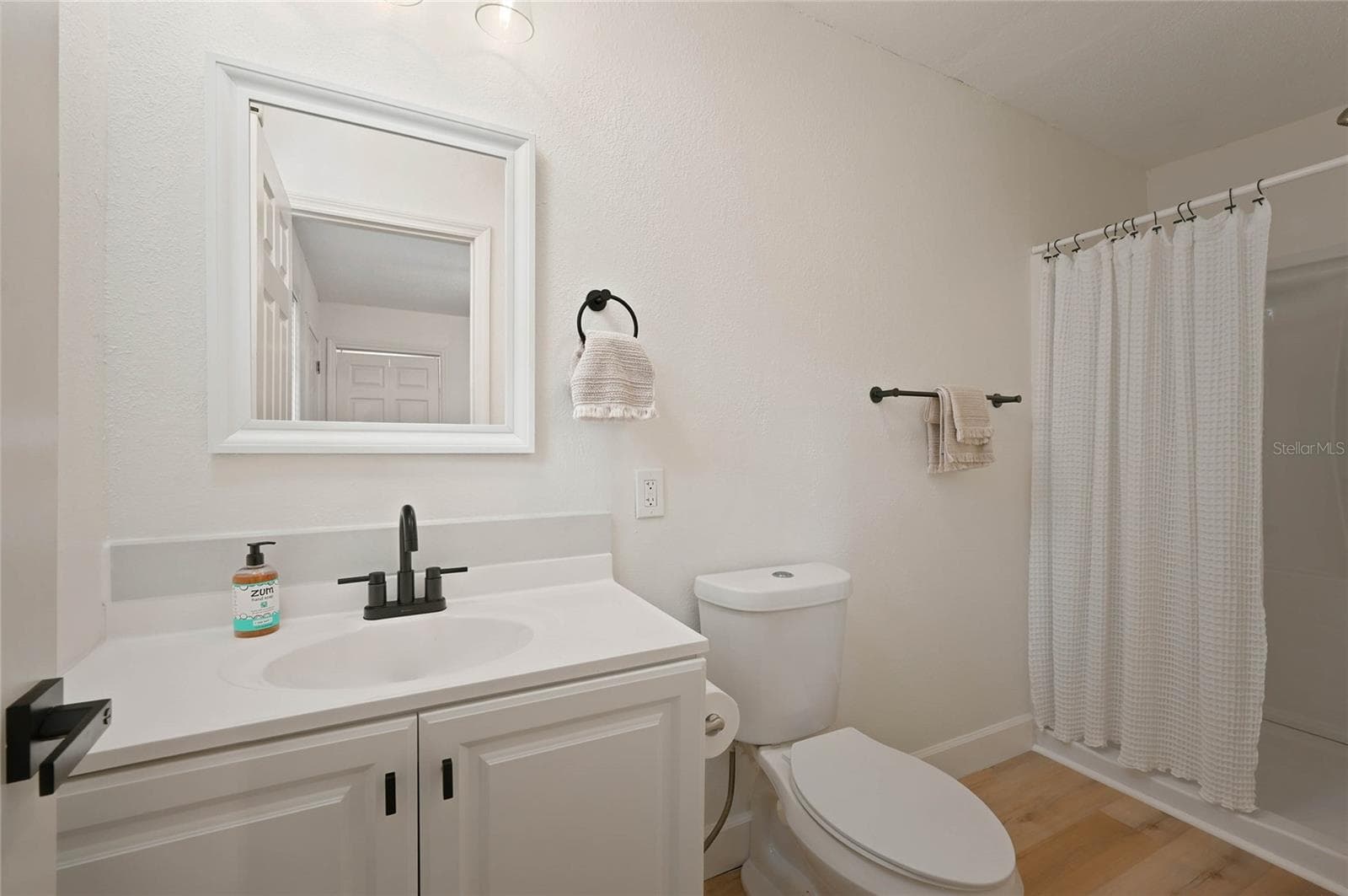 primary bath with nice shower and vanity - 556 OLIVER DR, NEW SMYRNA BEACH