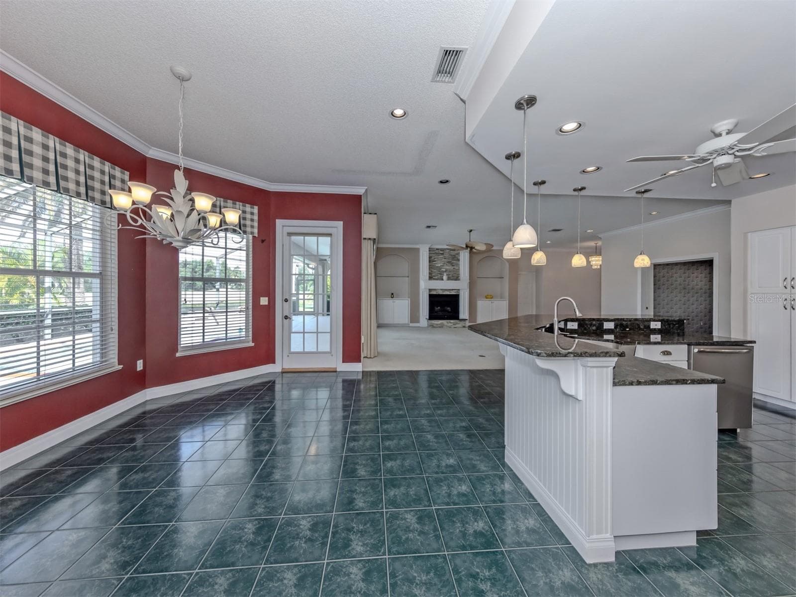 This home allows you to flow easily from kitchen, to dining, to great room to outside. Lots of open space - 1725 ARDRY WAY, VENICE