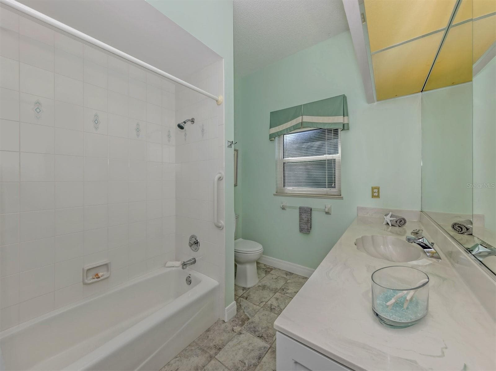The third bedroom ensuite includes a tub shower combination. - 1725 ARDRY WAY, VENICE